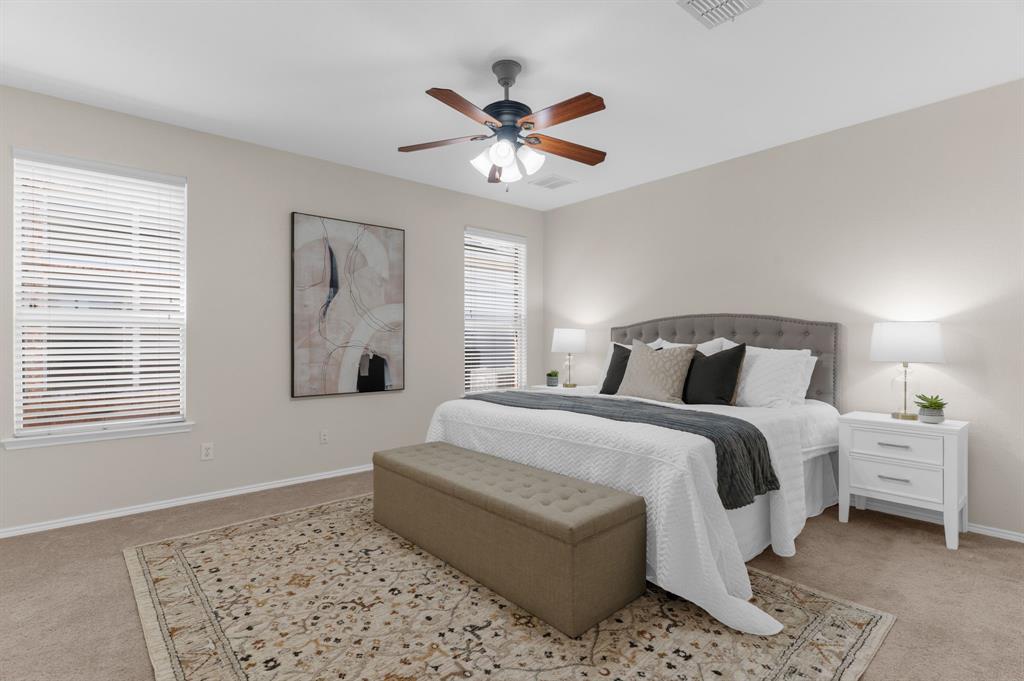 4607 Forest Park Road Plano, TX 75024 - Photo 13 of 40 a bedroom with a bed and window