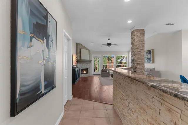 a large spacious bathroom with a tub and shower