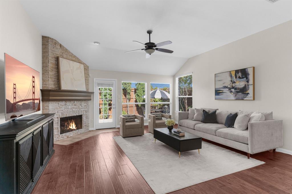 4607 Forest Park Road Plano, TX 75024 - Photo 28 of 40 a living room with furniture fireplace and window