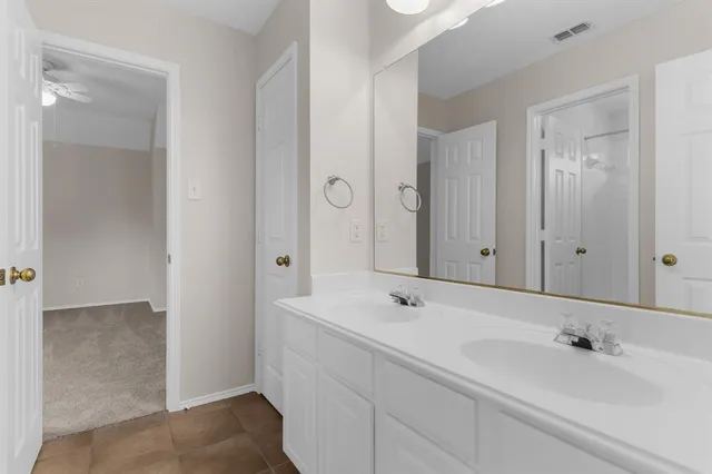 a bathroom with a sink and a tub