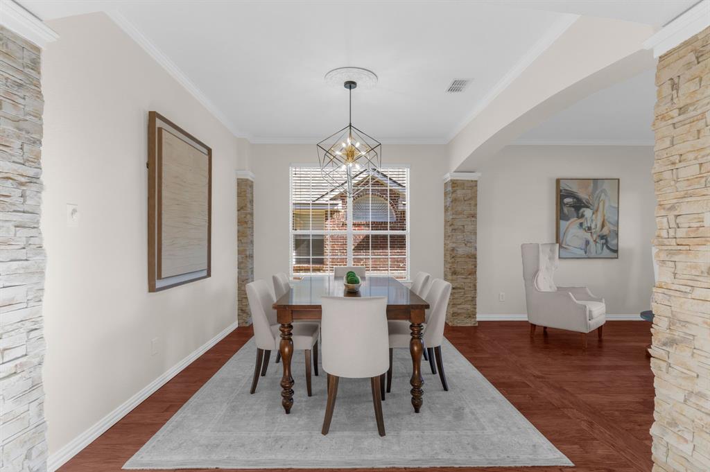 4607 Forest Park Road Plano, TX 75024 - Photo 10 of 40 a view of a dining room with furniture window and wooden floor