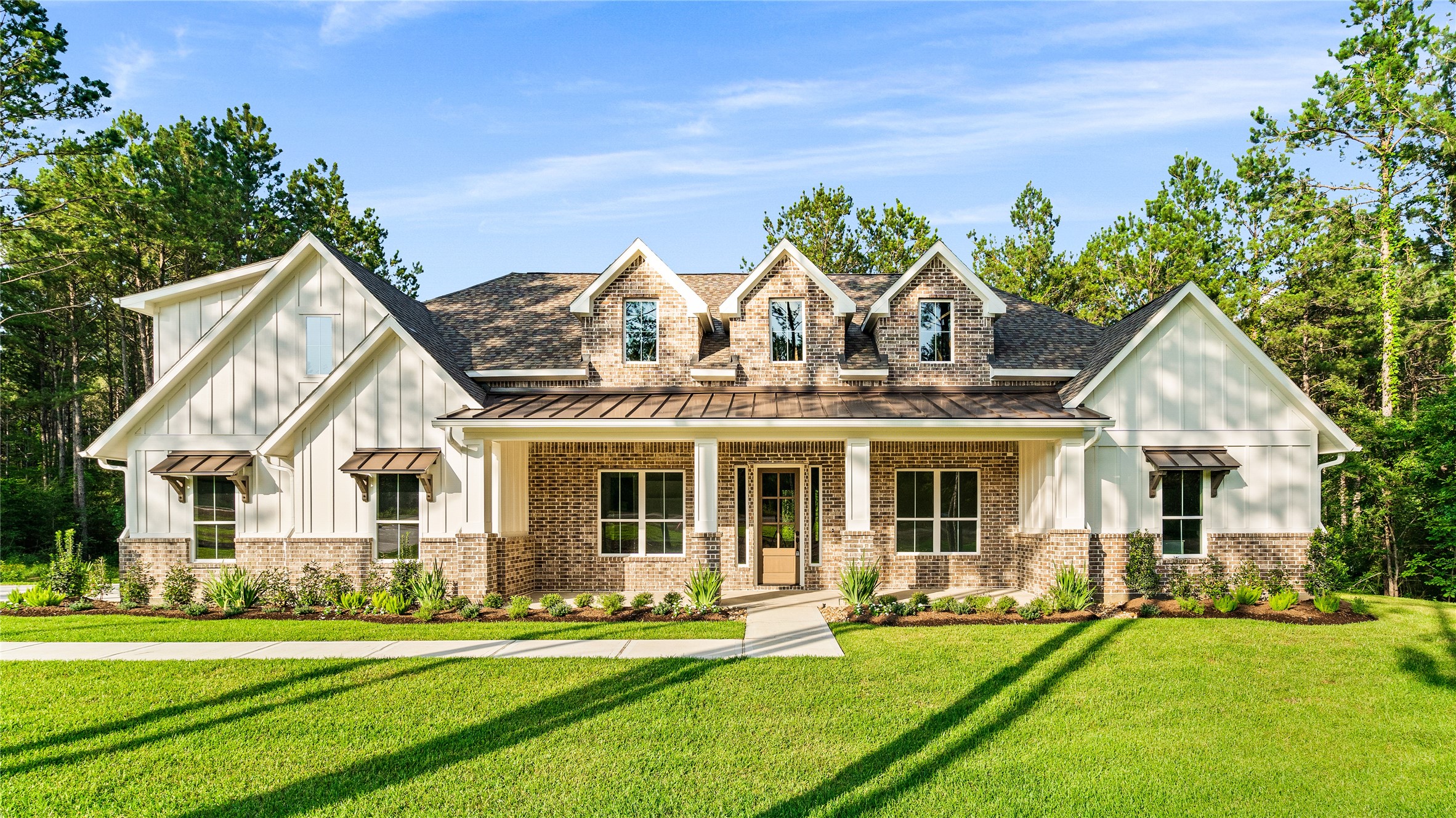 16046 Forest Mill Road Willis, TX 77378 - Photo 21 of 22 front view of a house with a yard