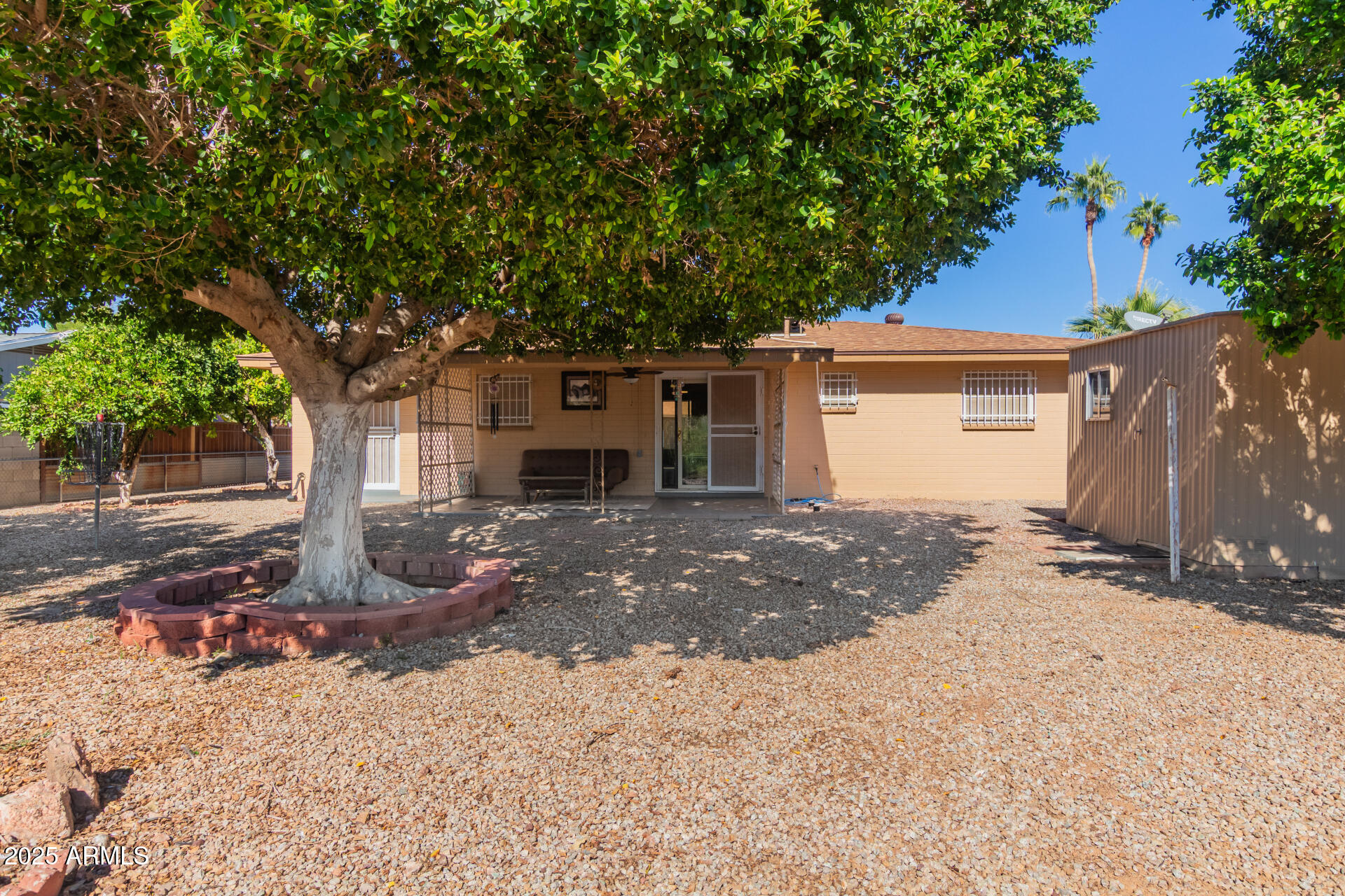 6149 East Decatur Street Mesa, AZ 85205 - Photo 23 of 24 a front view of a house with garden
