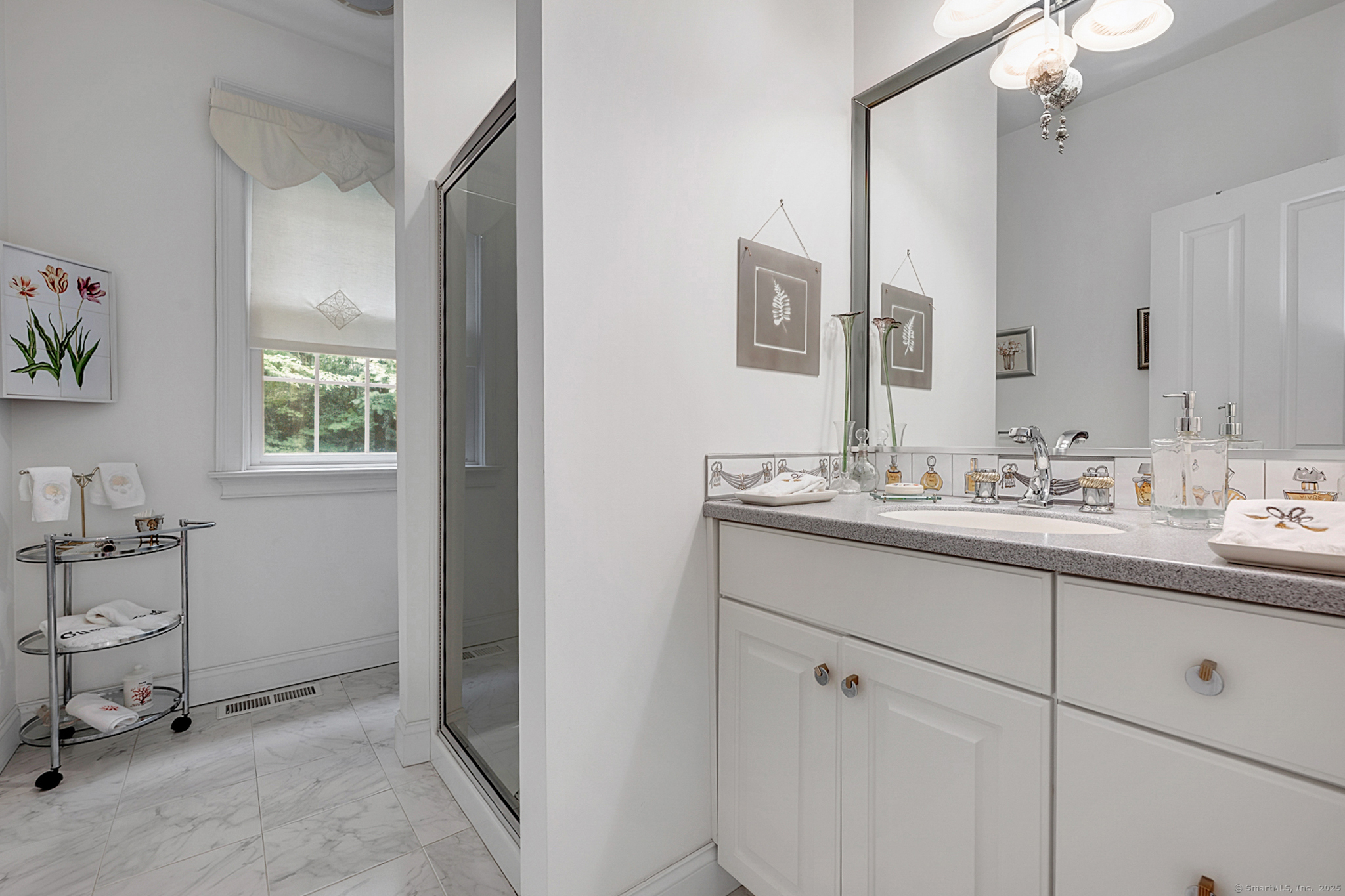 68 Hart Street Burlington, CT 06013 - Photo 18 of 39 a bathroom with a sink and a mirror