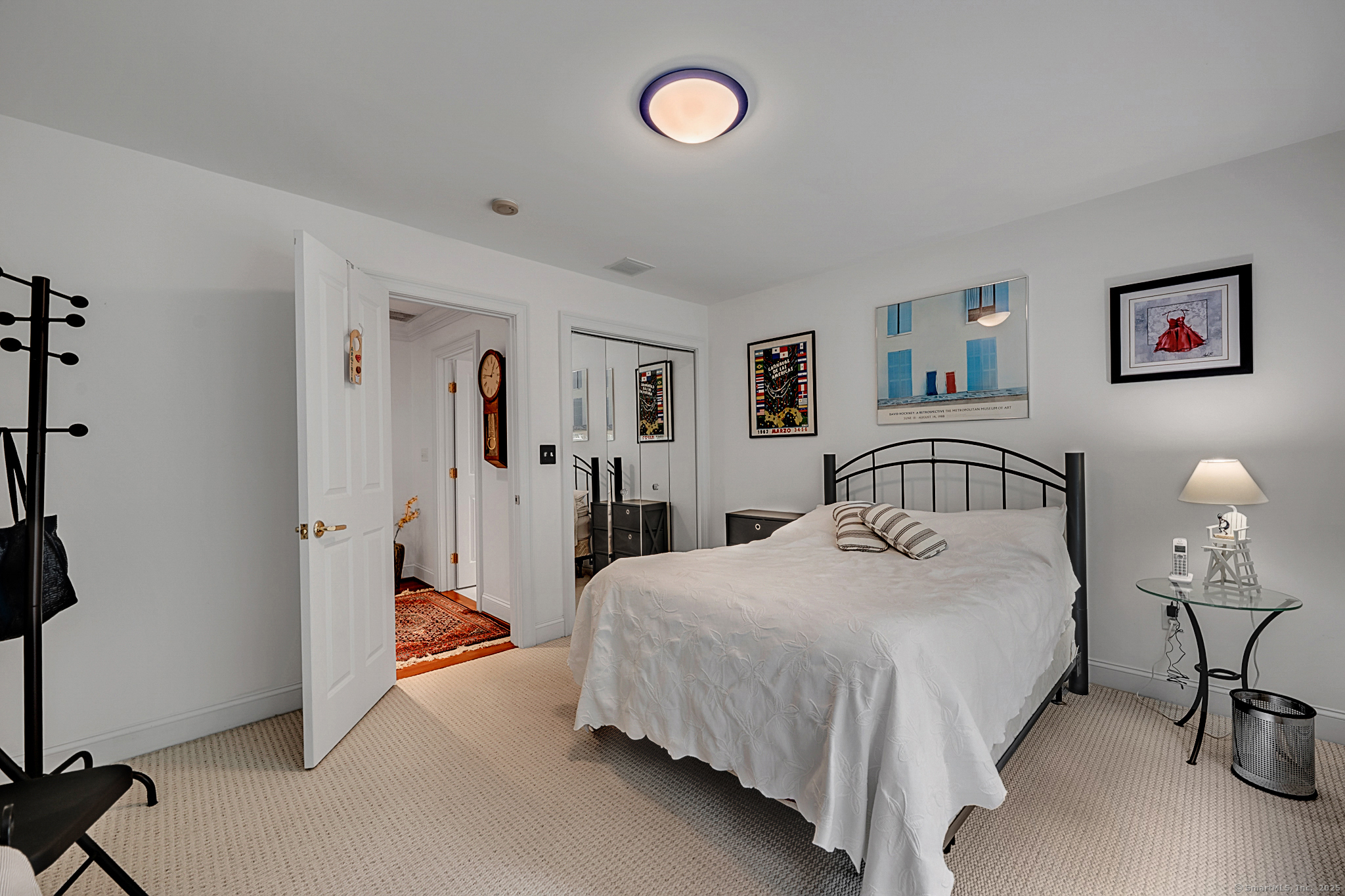 68 Hart Street Burlington, CT 06013 - Photo 26 of 39 a bedroom with a bed and a table