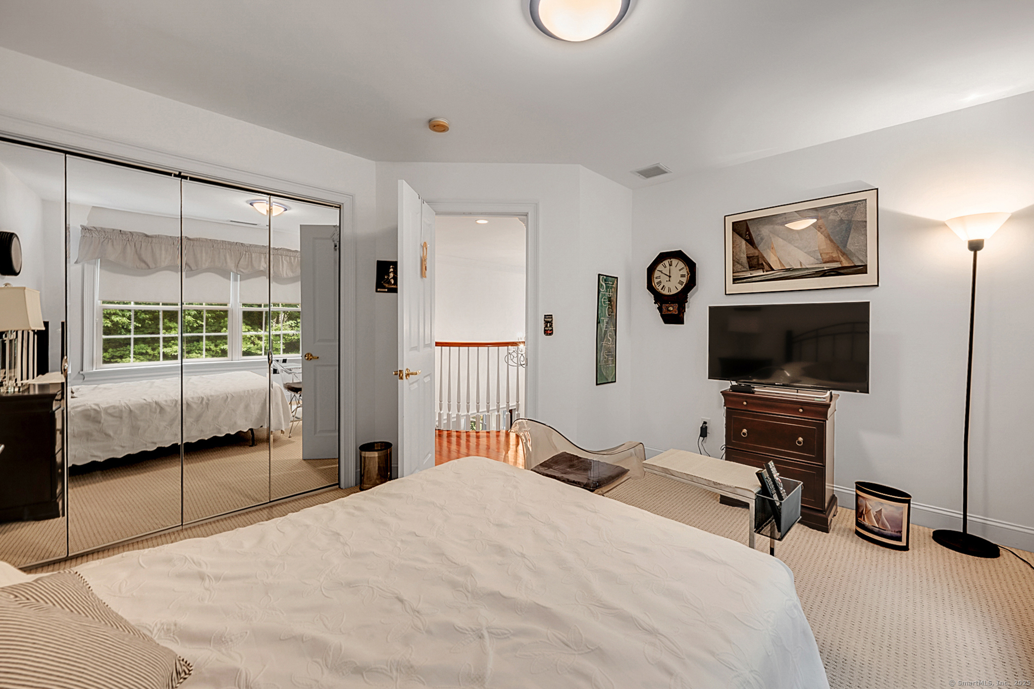 68 Hart Street Burlington, CT 06013 - Photo 29 of 39 a bedroom with a bed and a flat screen tv