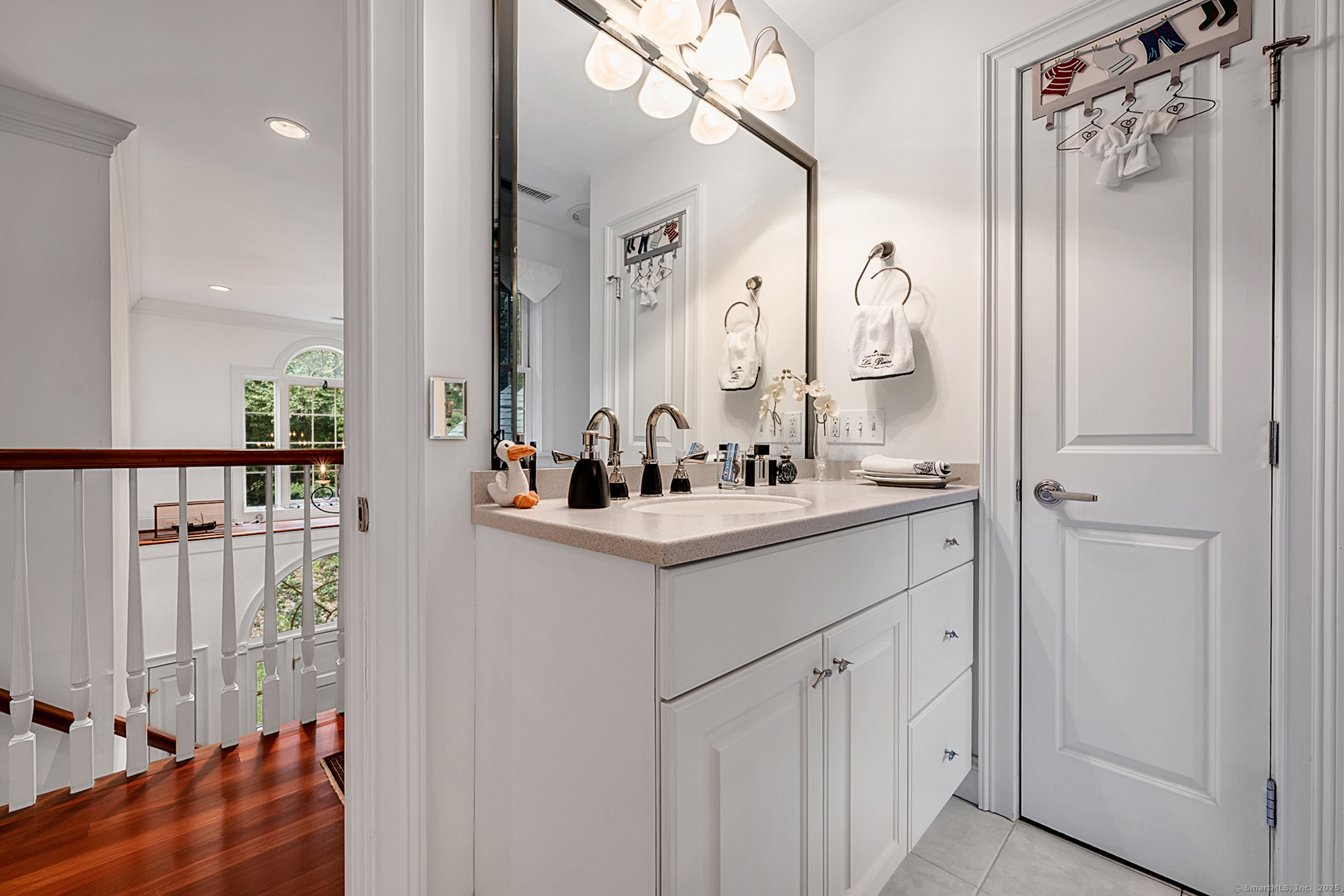 68 Hart Street Burlington, CT 06013 - Photo 32 of 39 a bathroom with a double vanity sink mirror and shower