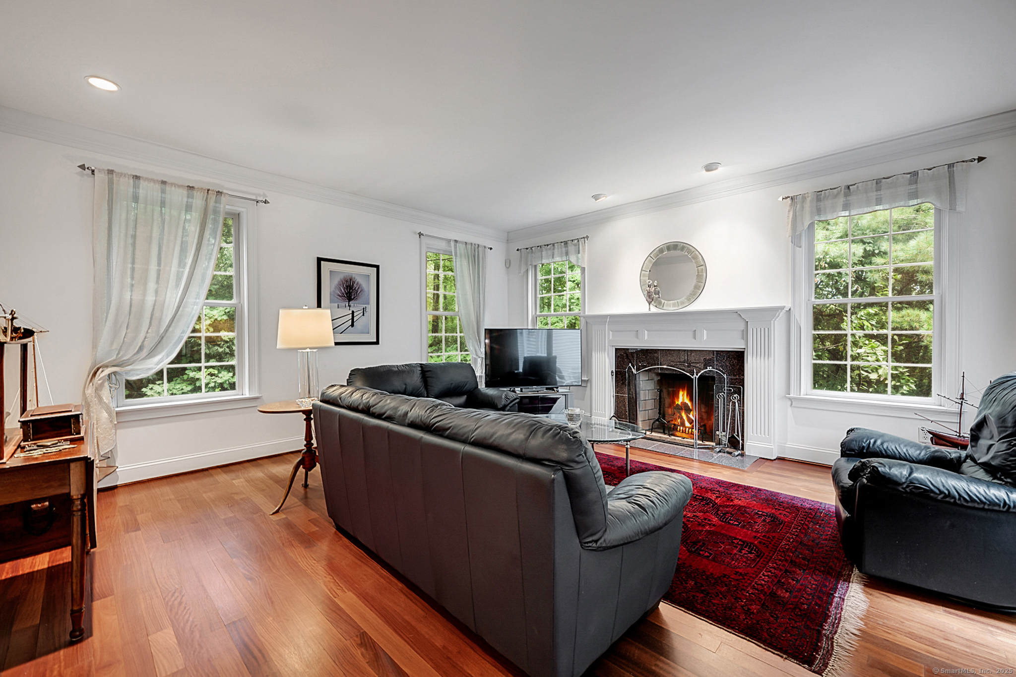 68 Hart Street Burlington, CT 06013 - Photo 9 of 39 a living room with furniture and a fireplace