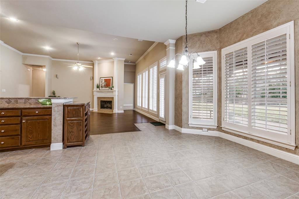 6027 Rathbone Drive Parker, TX 75002 - Photo 12 of 39 a view of a kitchen with a stove cabinets and a kitchen