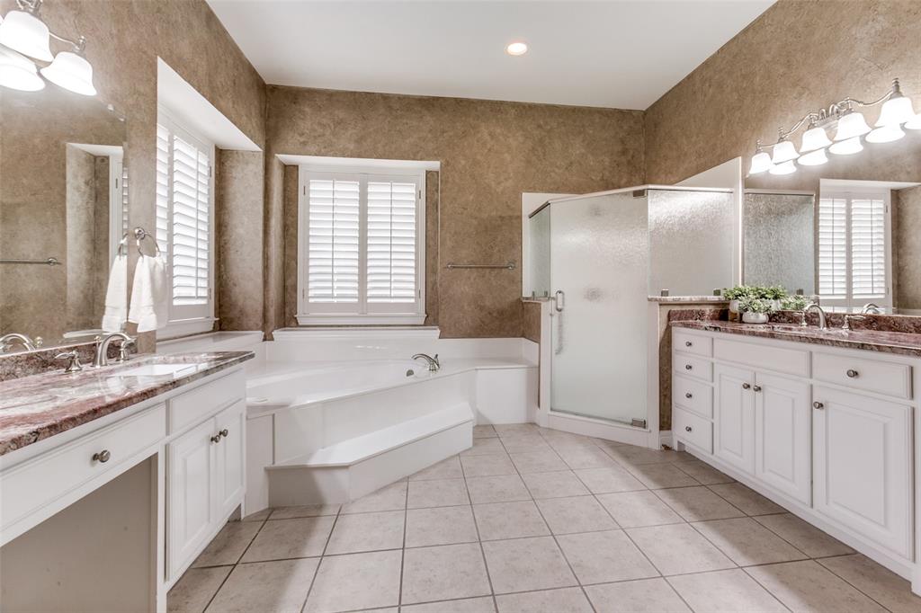 6027 Rathbone Drive Parker, TX 75002 - Photo 3 of 39 Beautiful & spacious. The primary bath features two separate vanities, a separate shower, a huge jetted garden tub, and separate water closet.