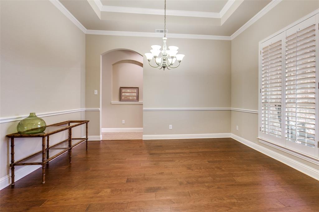 6027 Rathbone Drive Parker, TX 75002 - Photo 7 of 39 a view of a room with wooden floor lounge chair and windows