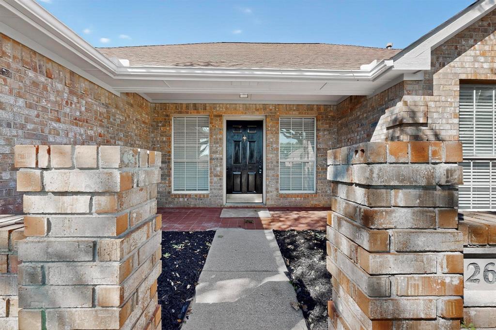 2601 Daisy Lane Rowlett, TX 75089 - Photo 4 of 36 a view of a pathway along the building