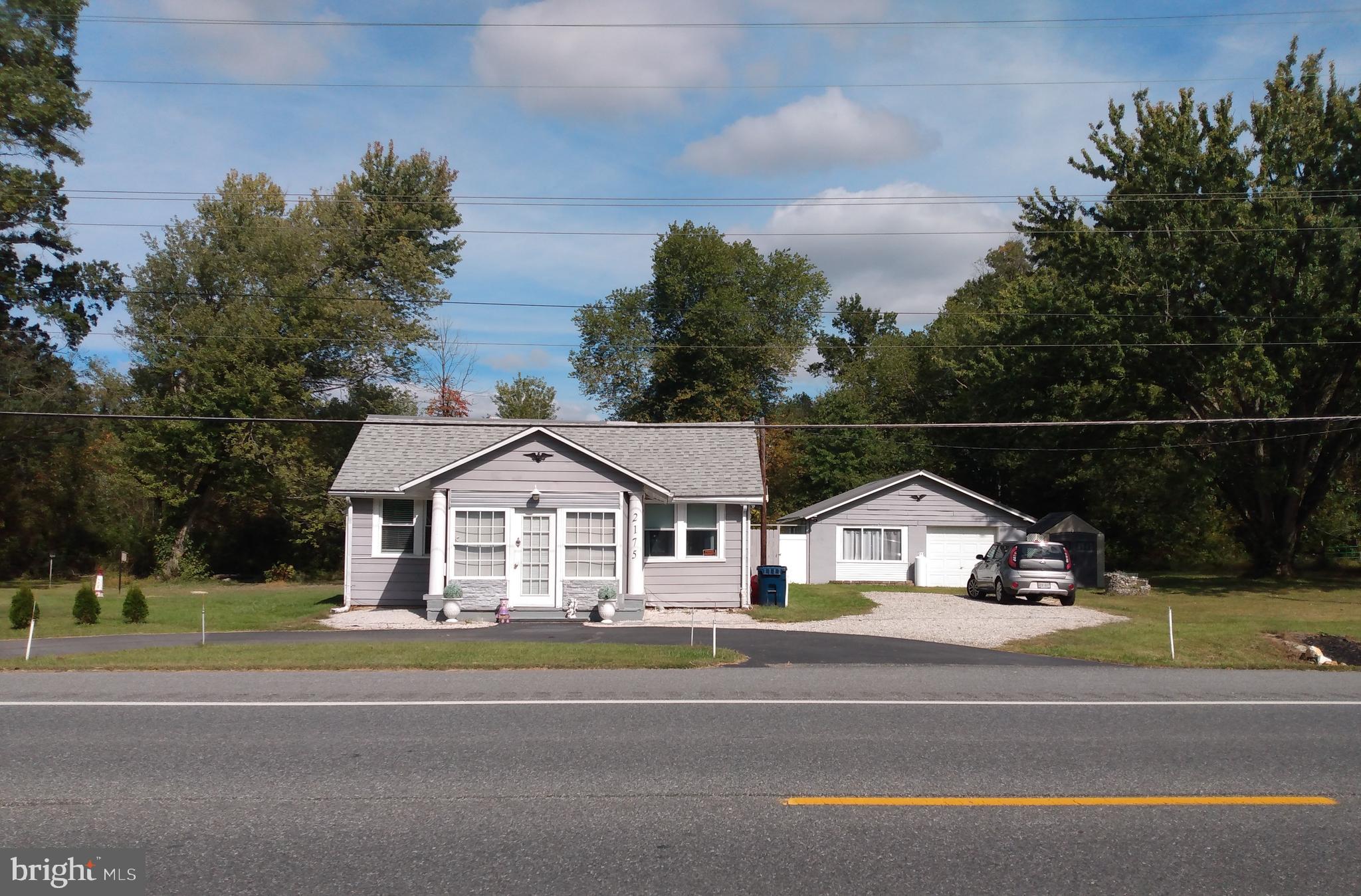 a view of street along with houses