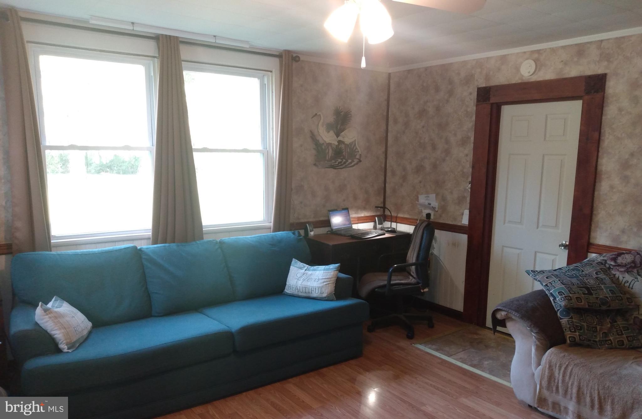 2175 Telegraph Road Rising Sun, MD 21911 - Photo 13 of 14 a living room with furniture and a window