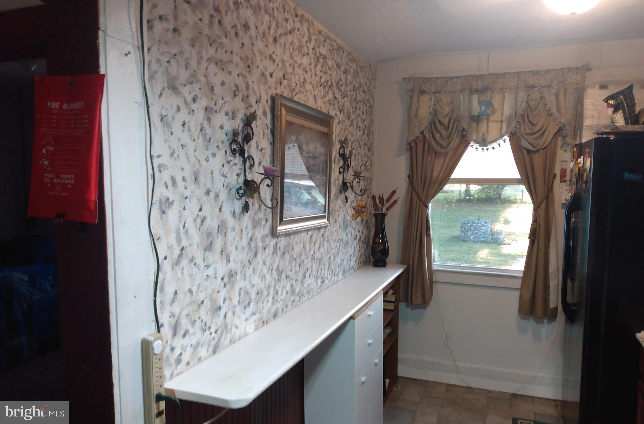 2175 Telegraph Road Rising Sun, MD 21911 - Photo 2 of 14 a bathroom with a toilet sink and window