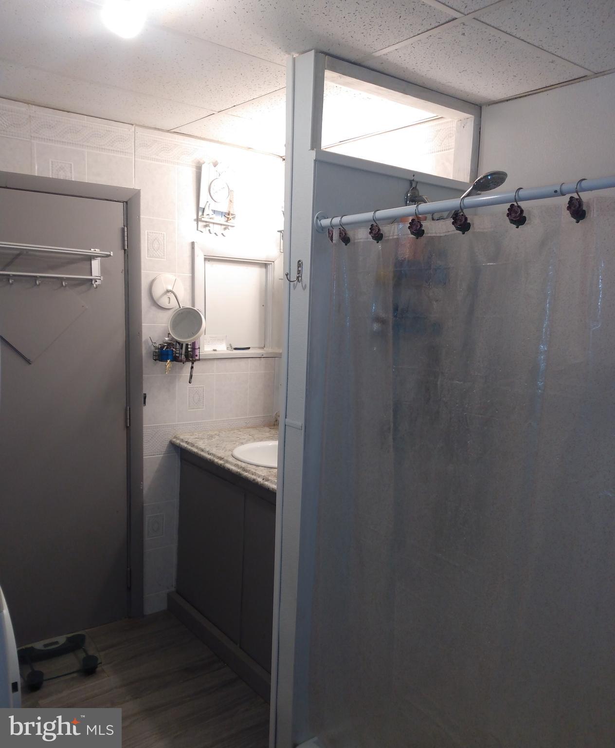 2175 Telegraph Road Rising Sun, MD 21911 - Photo 5 of 14 a bathroom with a shower and a sink