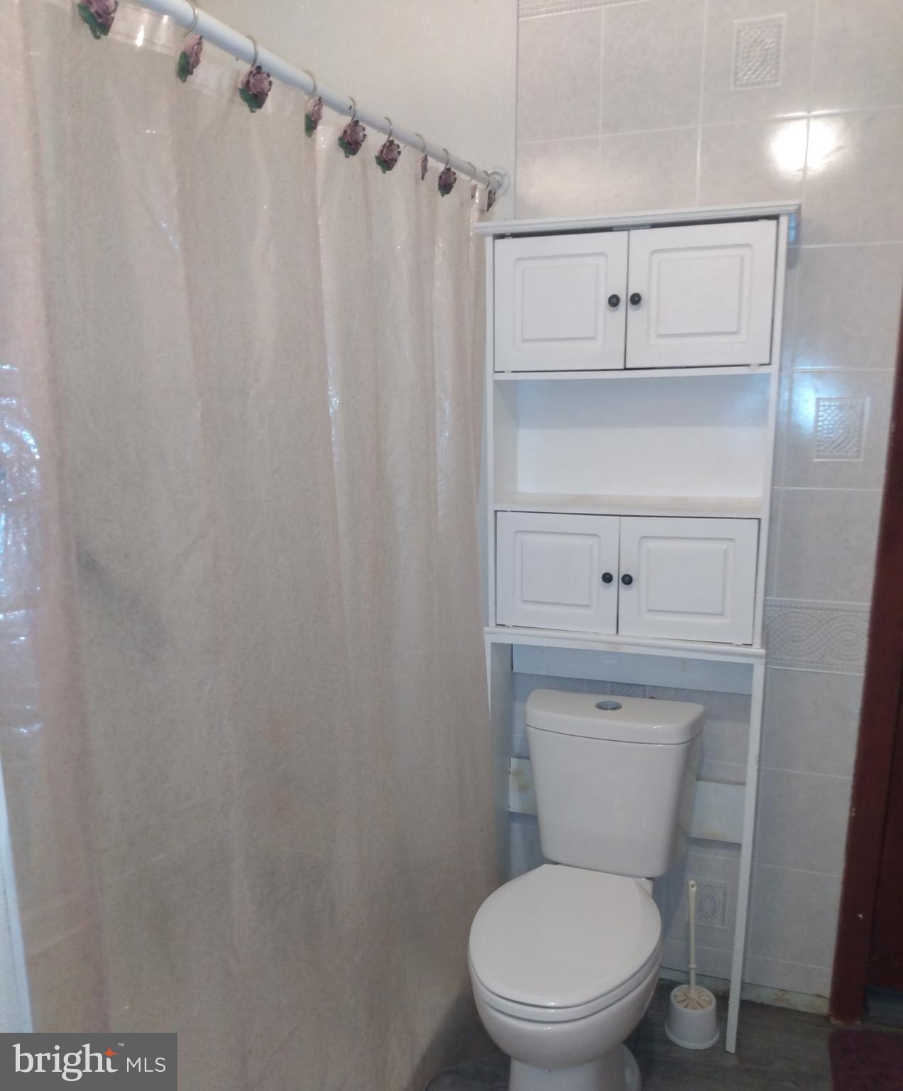 2175 Telegraph Road Rising Sun, MD 21911 - Photo 6 of 14 a toilet sitting in a bathroom next to a sink