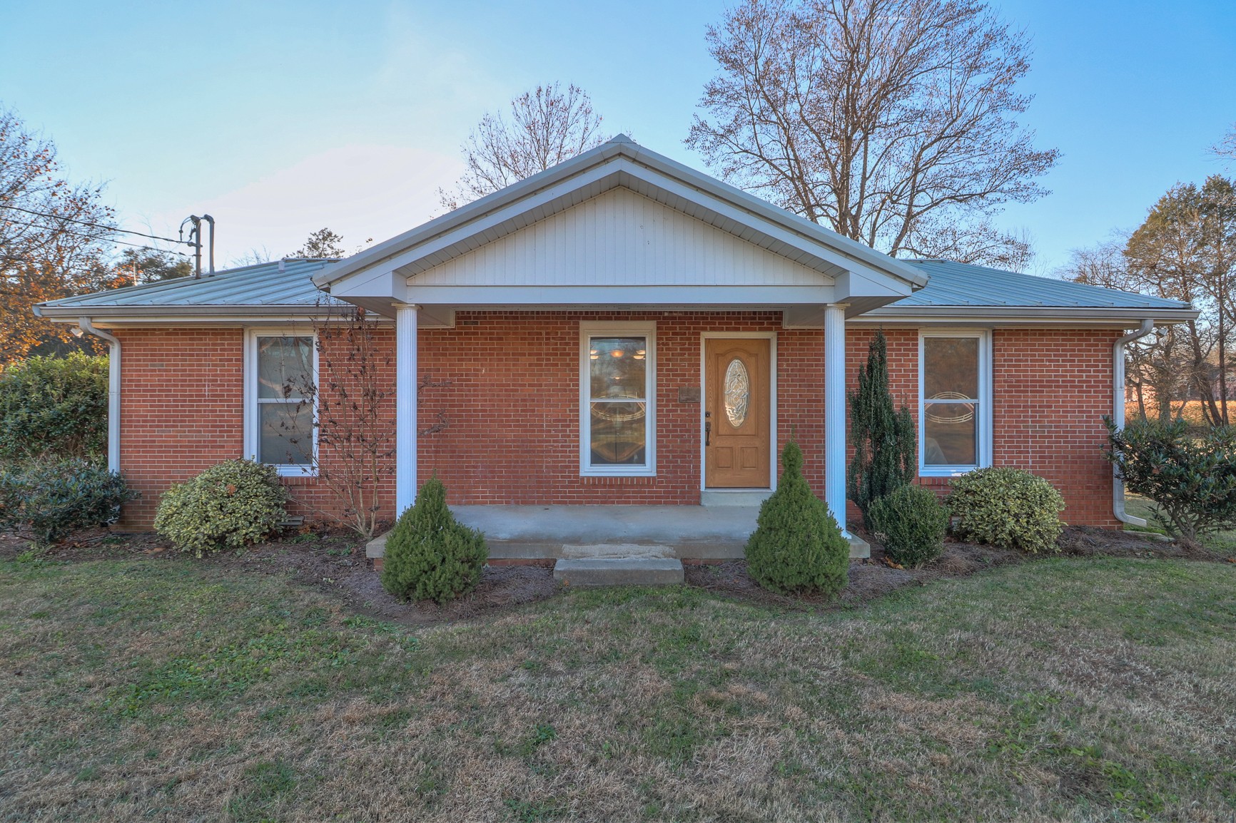 1824 Logue Road Mount Juliet, TN 37122 - Photo 1 of 53 a front view of a house with garden