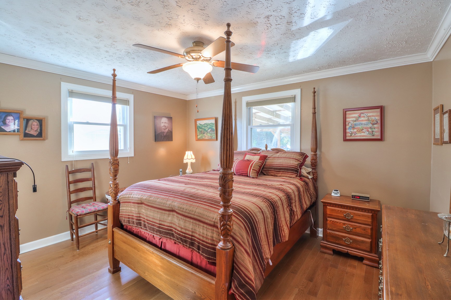 1824 Logue Road Mount Juliet, TN 37122 - Photo 13 of 53 a bedroom with a bed wooden floor and window