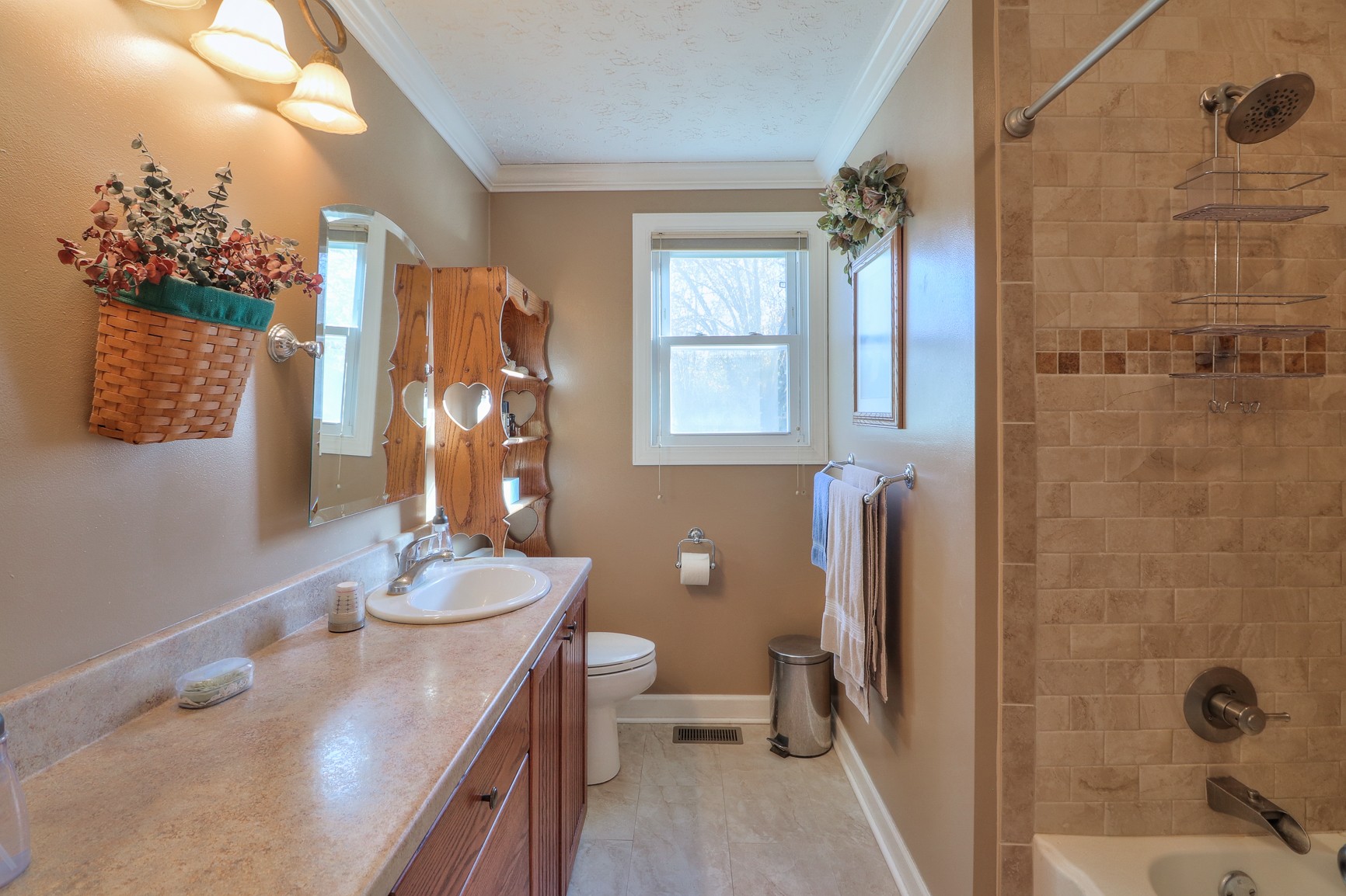 1824 Logue Road Mount Juliet, TN 37122 - Photo 16 of 53 a bathroom with a granite countertop sink a toilet and shower