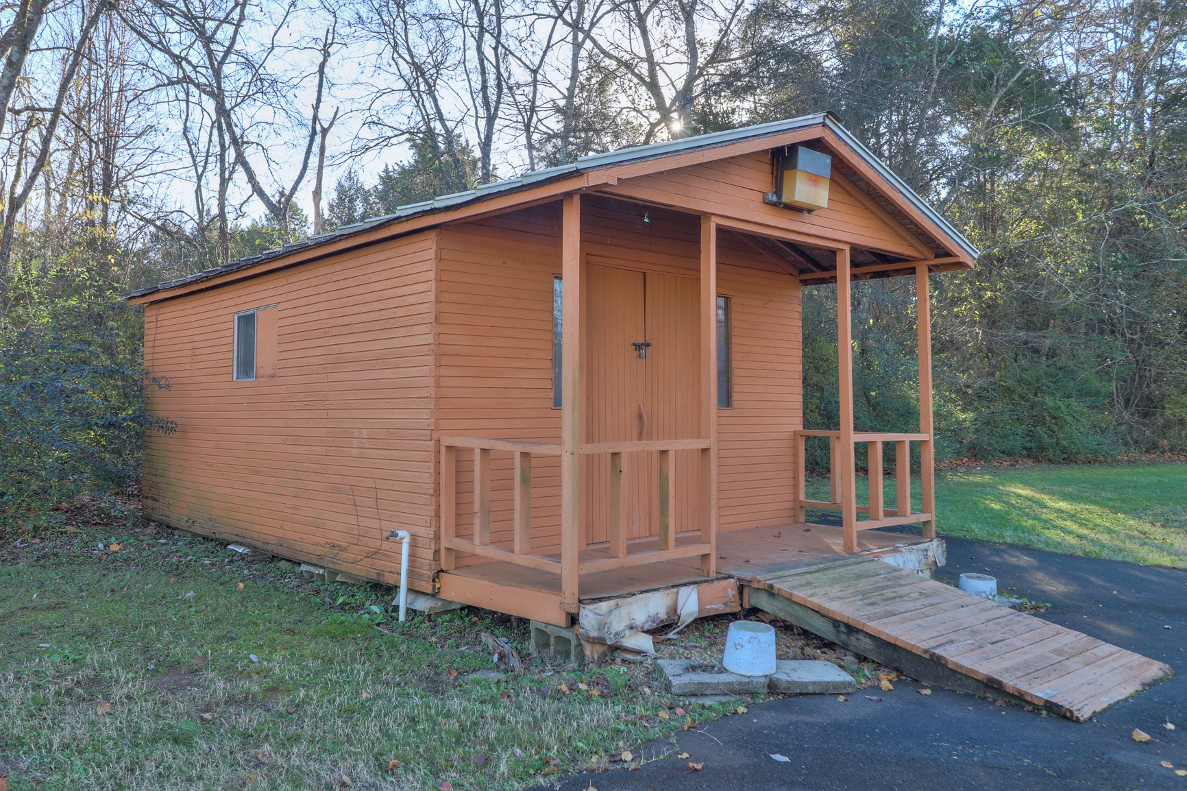 1824 Logue Road Mount Juliet, TN 37122 - Photo 32 of 53 a view of a small house with a yard