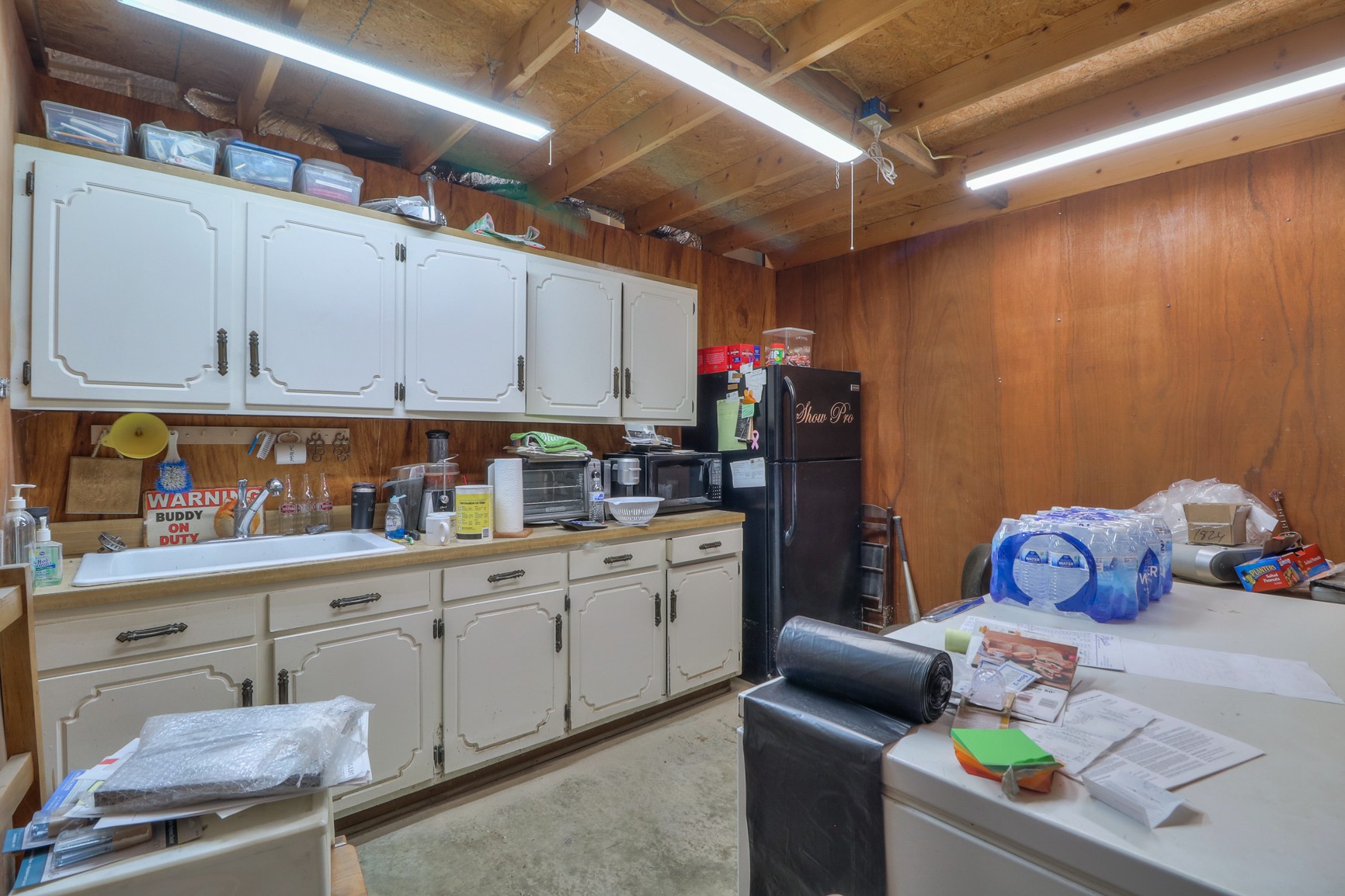 1824 Logue Road Mount Juliet, TN 37122 - Photo 40 of 53 a kitchen that has a sink and a stove in it