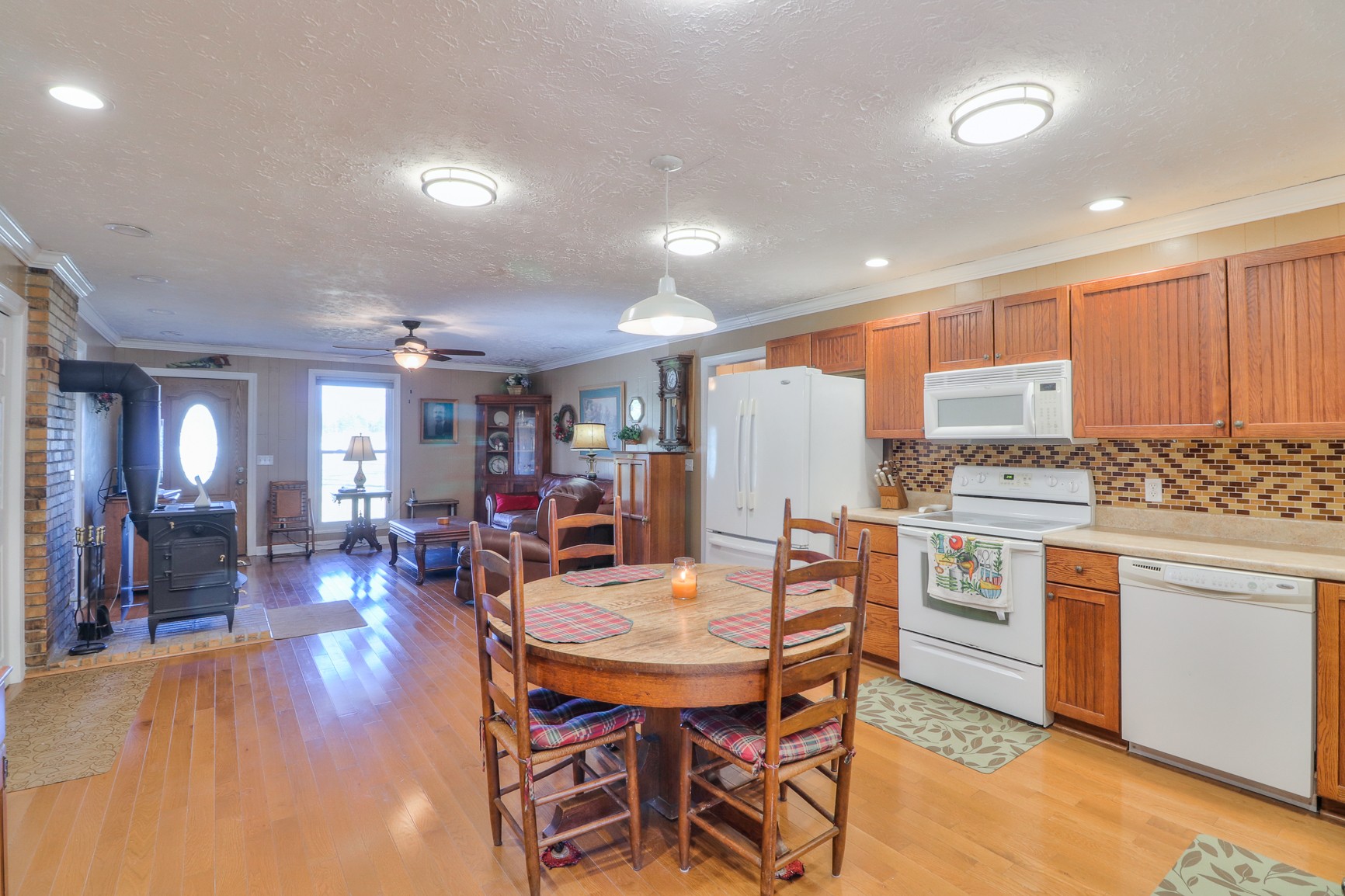 1824 Logue Road Mount Juliet, TN 37122 - Photo 7 of 53 a view of a dining room with furniture and wooden floor