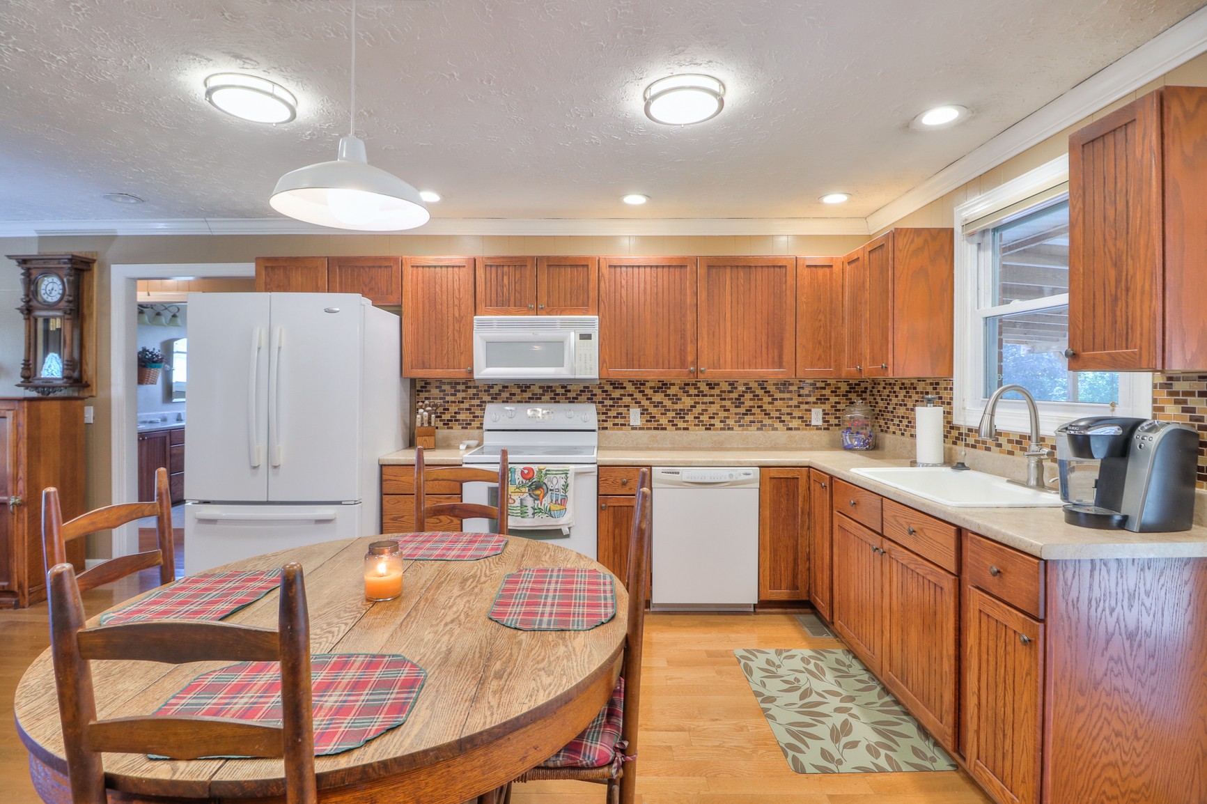 1824 Logue Road Mount Juliet, TN 37122 - Photo 8 of 53 a kitchen with stainless steel appliances granite countertop a sink stove and refrigerator
