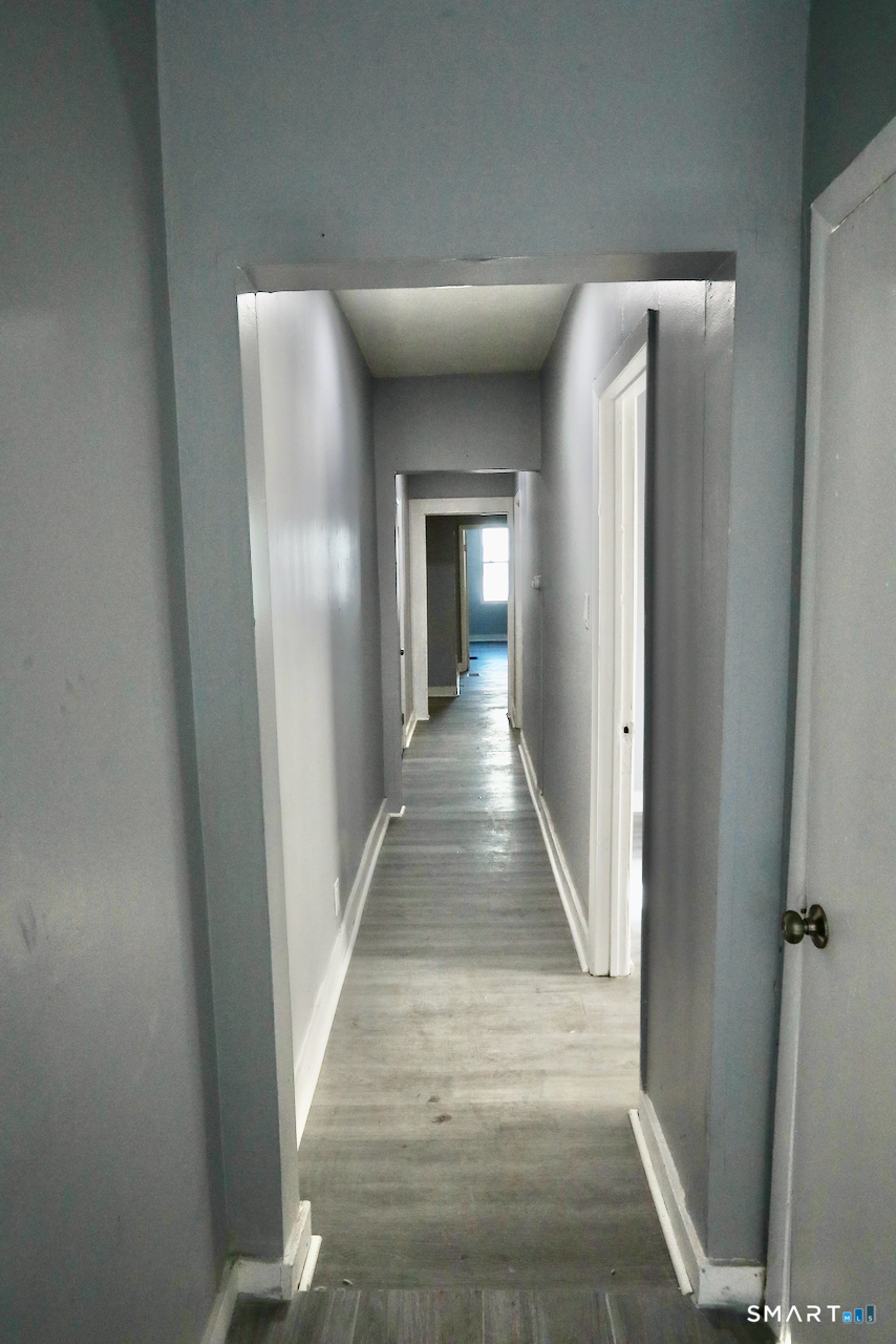 156 Poplar Street, Unit 1 New Haven, CT 06513 - Photo 29 of 31 a view of gallery with wooden floor