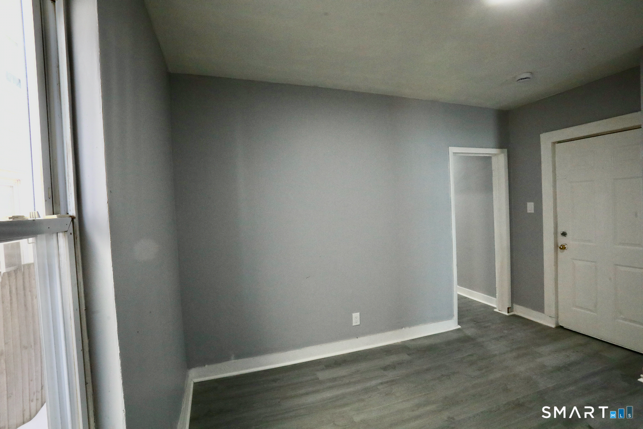 156 Poplar Street, Unit 1 New Haven, CT 06513 - Photo 9 of 31 a view of an empty room