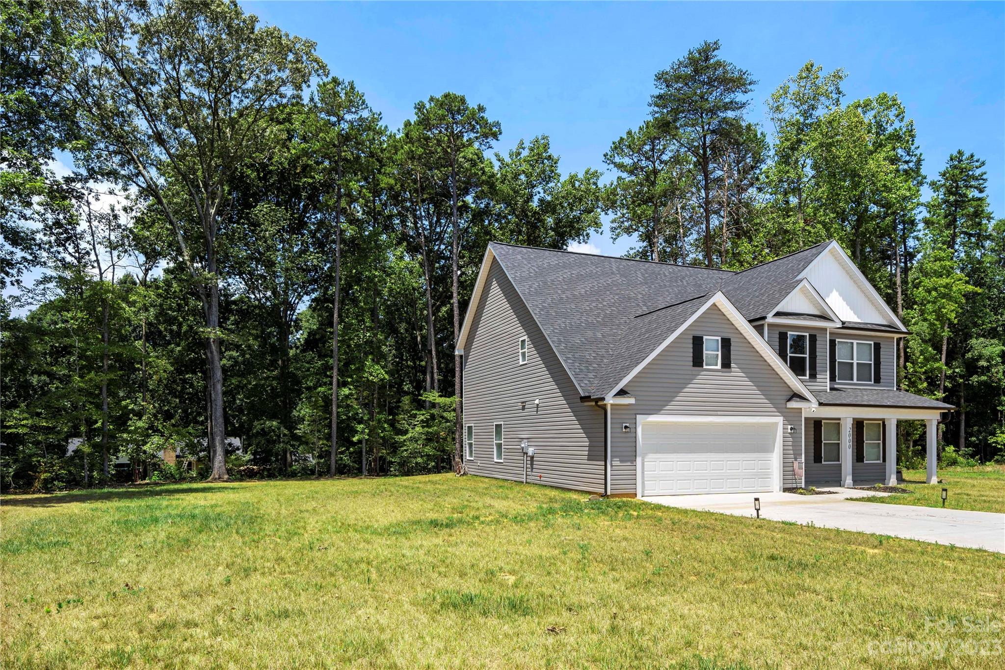2000 Stirewalt Road China Grove, NC 28023 - Photo 38 of 43 a view of a big house with a big yard and large trees