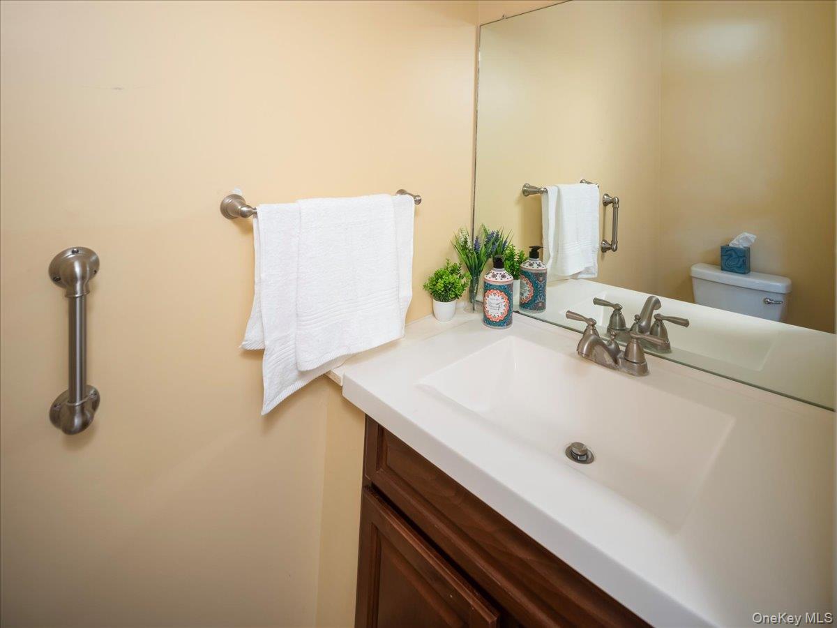 3 Spring Rock Place Spring Valley, NY 10977 - Photo 9 of 42 Lavatory adjacent to entry foyer