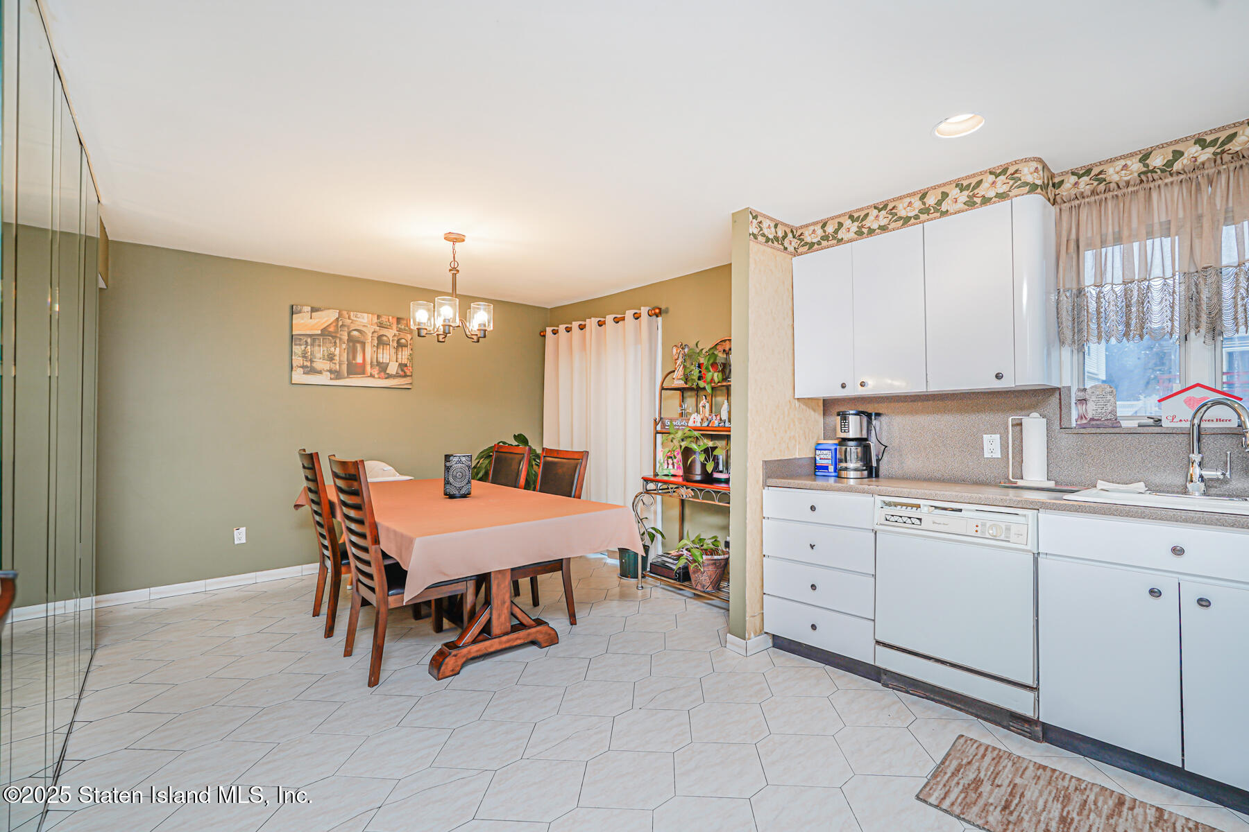 443 Ridgewood Avenue Staten Island, NY 10312 - Photo 11 of 26 a room with furniture and window