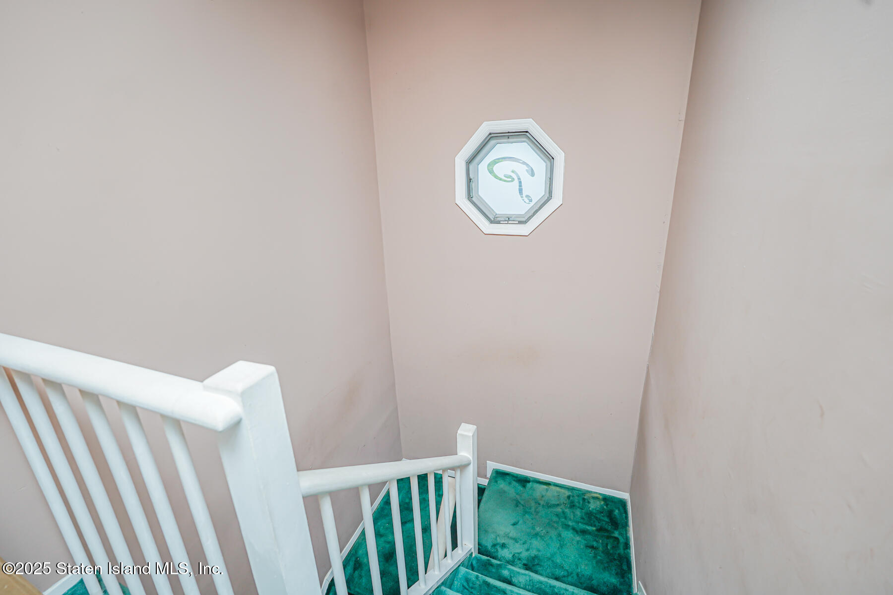 443 Ridgewood Avenue Staten Island, NY 10312 - Photo 12 of 26 a view of a hallway with wooden floor