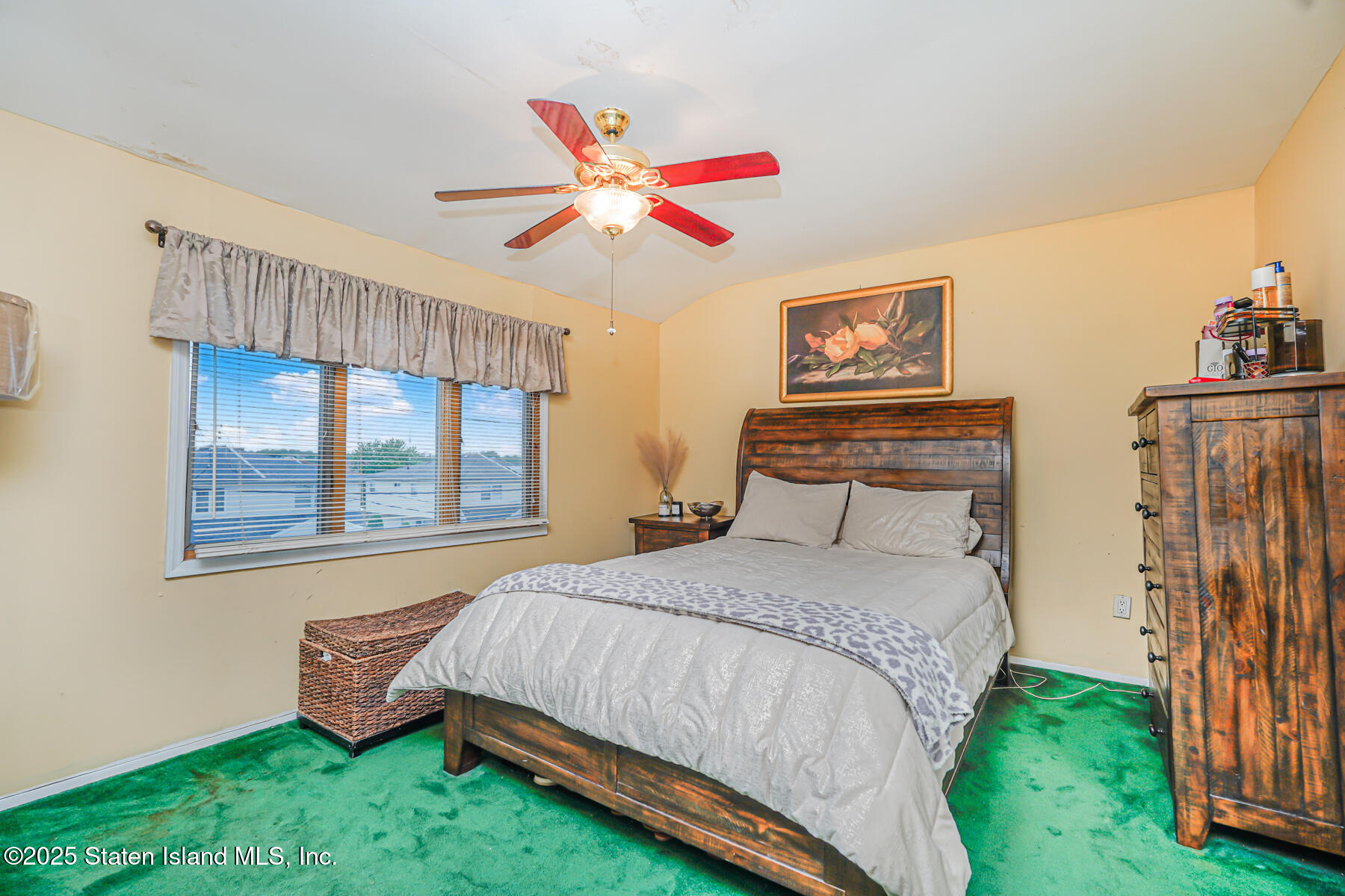 443 Ridgewood Avenue Staten Island, NY 10312 - Photo 13 of 26 a bedroom with a bed and a window