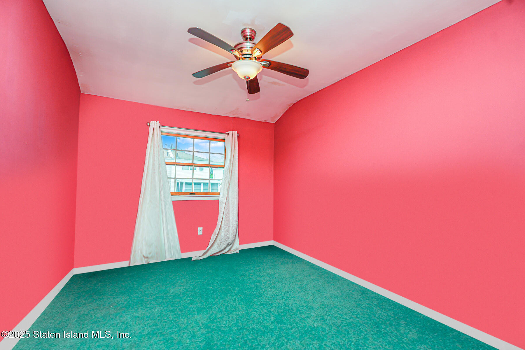 443 Ridgewood Avenue Staten Island, NY 10312 - Photo 18 of 26 a view of an empty room with window