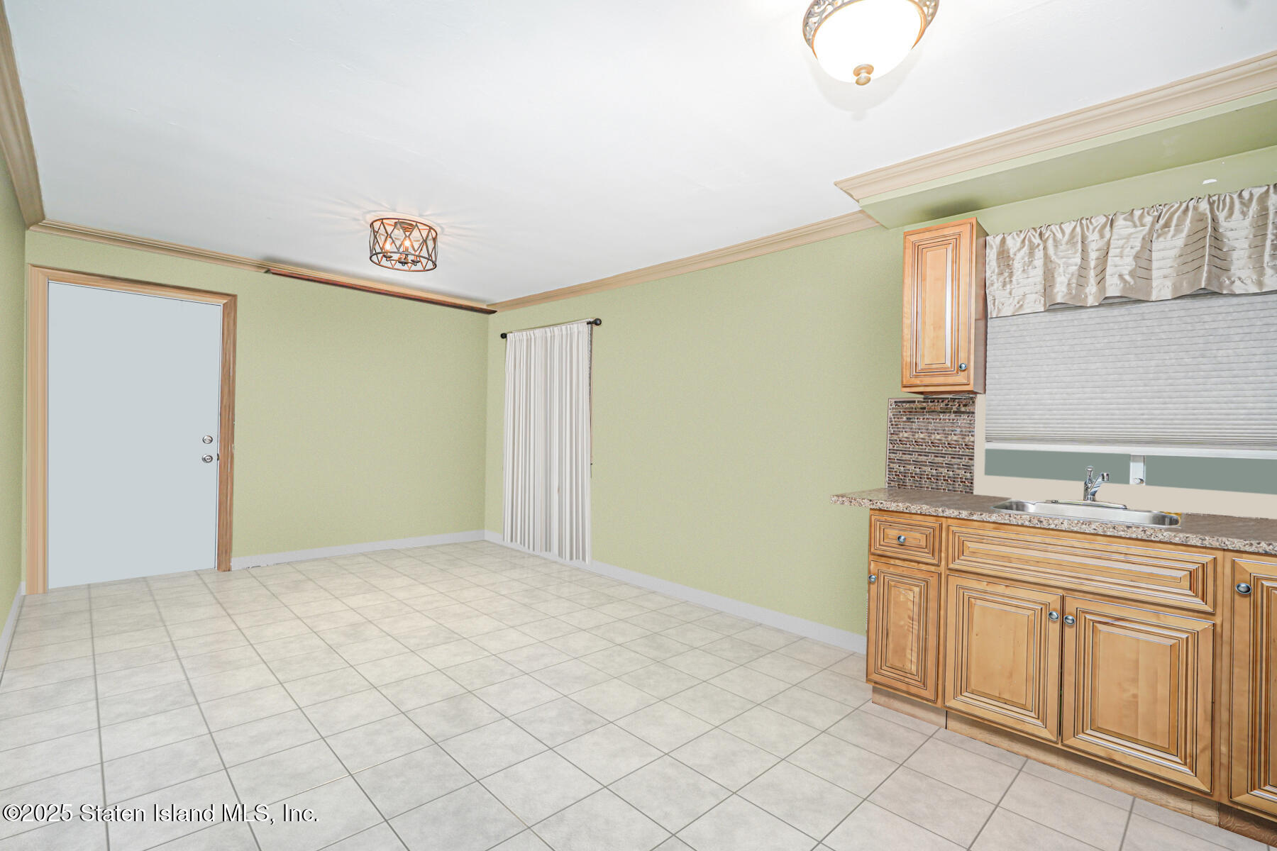 443 Ridgewood Avenue Staten Island, NY 10312 - Photo 21 of 26 a view of a kitchen with cabinets