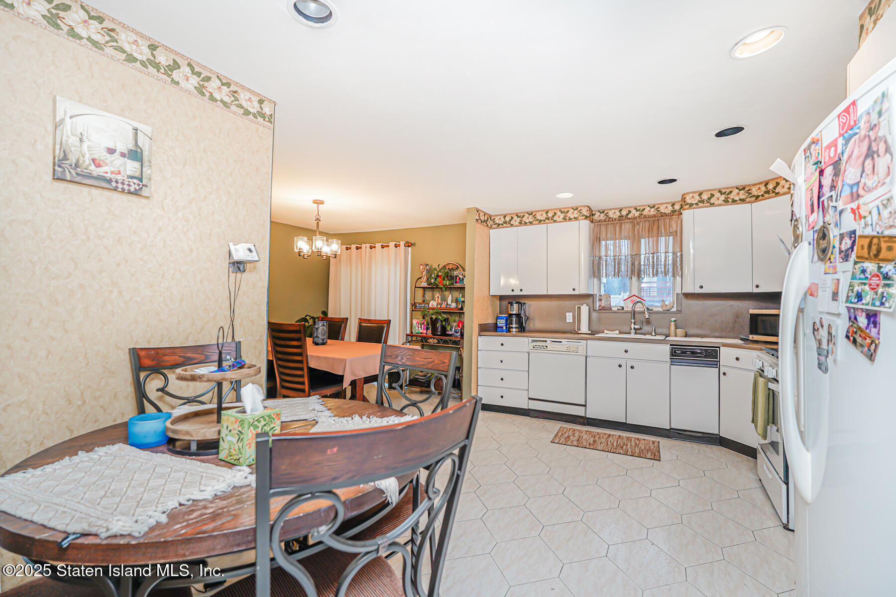 443 Ridgewood Avenue Staten Island, NY 10312 - Photo 10 of 26 a view of a kitchen with workspace and a window