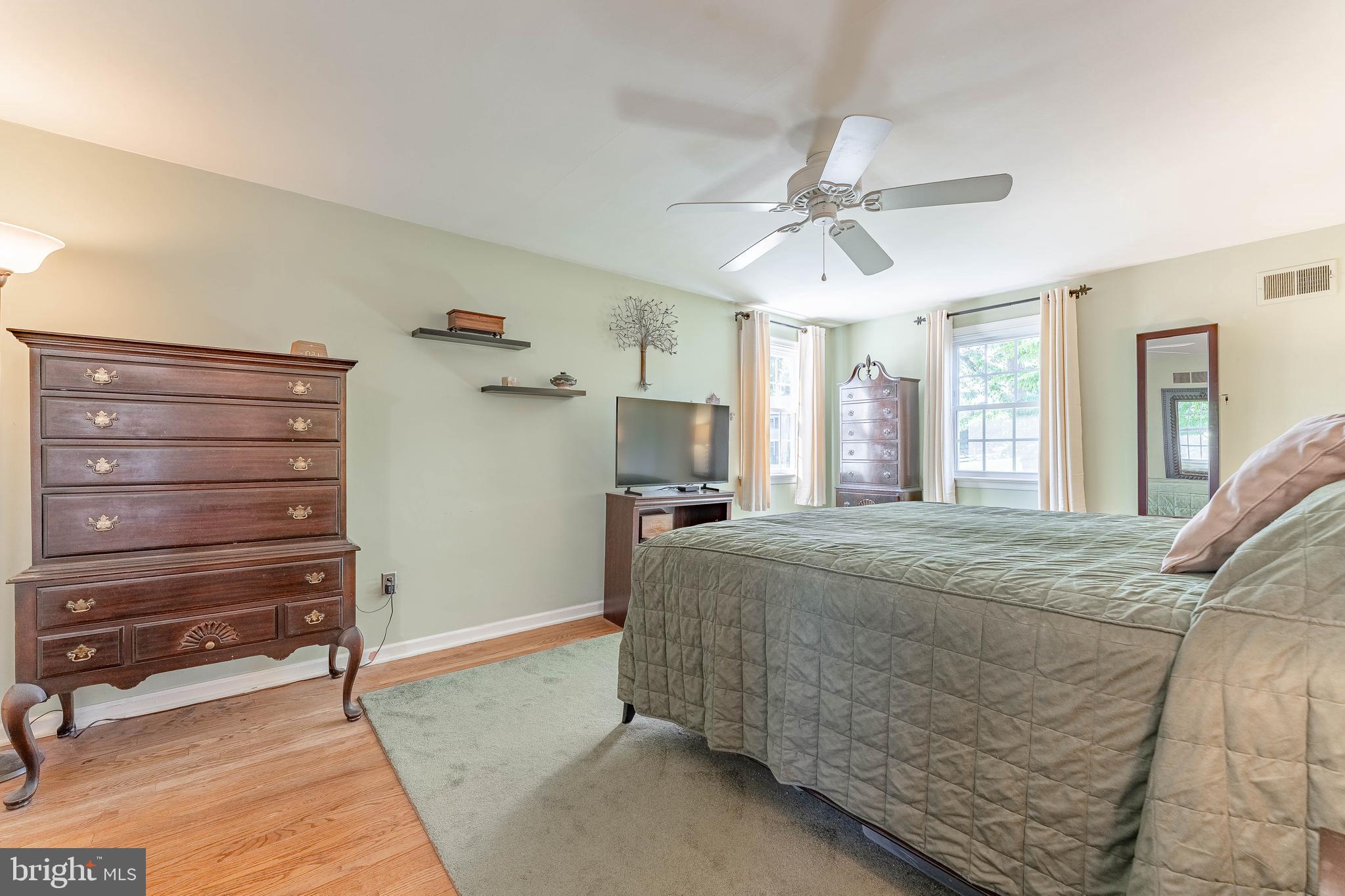 84 North Spring Lane Phoenixville, PA 19460 - Photo 26 of 51 a bedroom with a bed and a chandelier