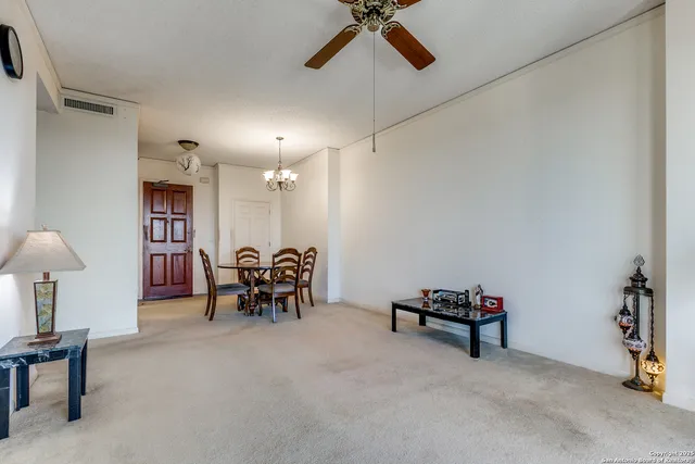 a view of a livingroom with furniture and a livingroom
