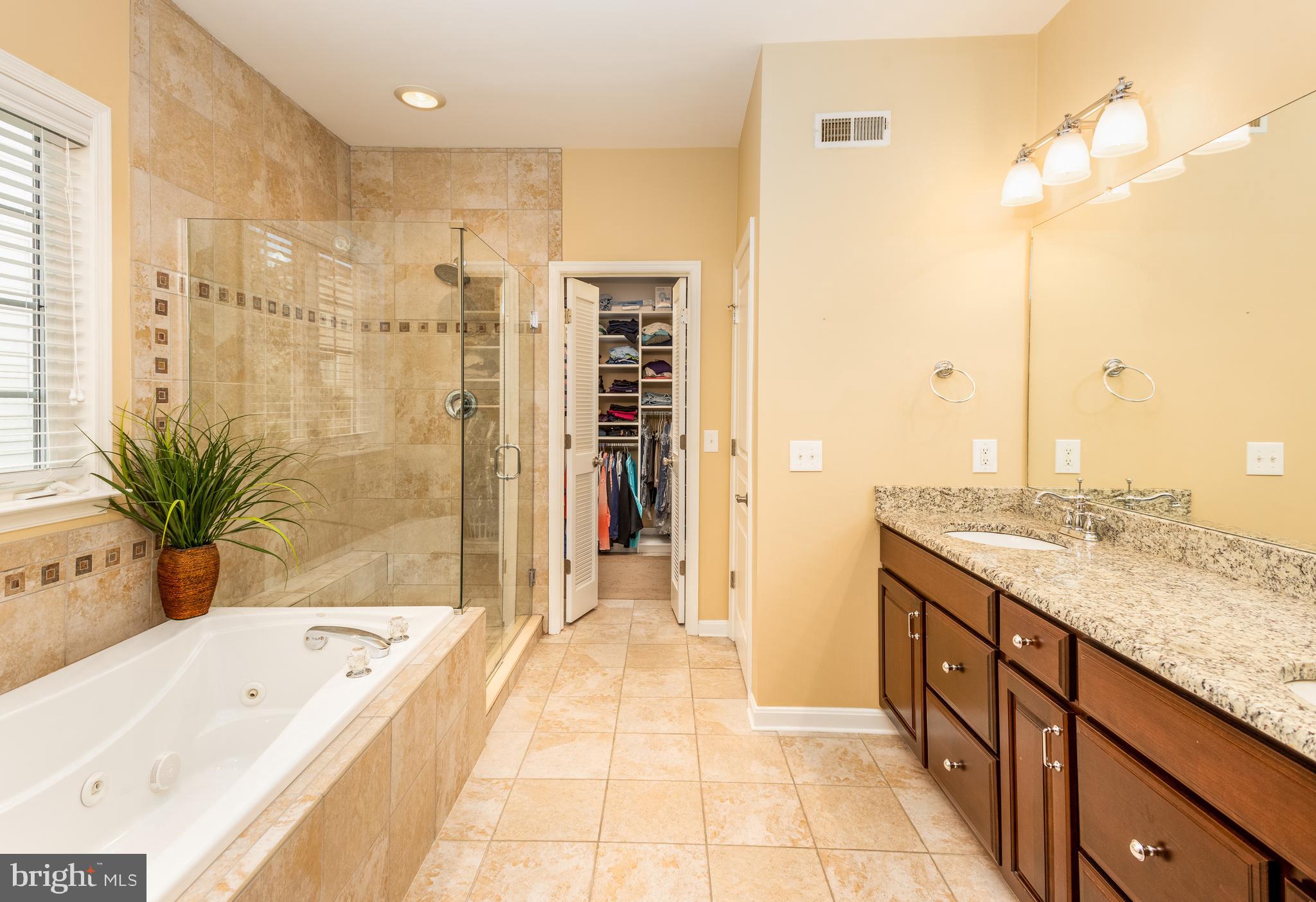 305 Aster Circle Kennett Square, PA 19348 - Photo 15 of 26 Master Bath leading to a spacious walk-in closet