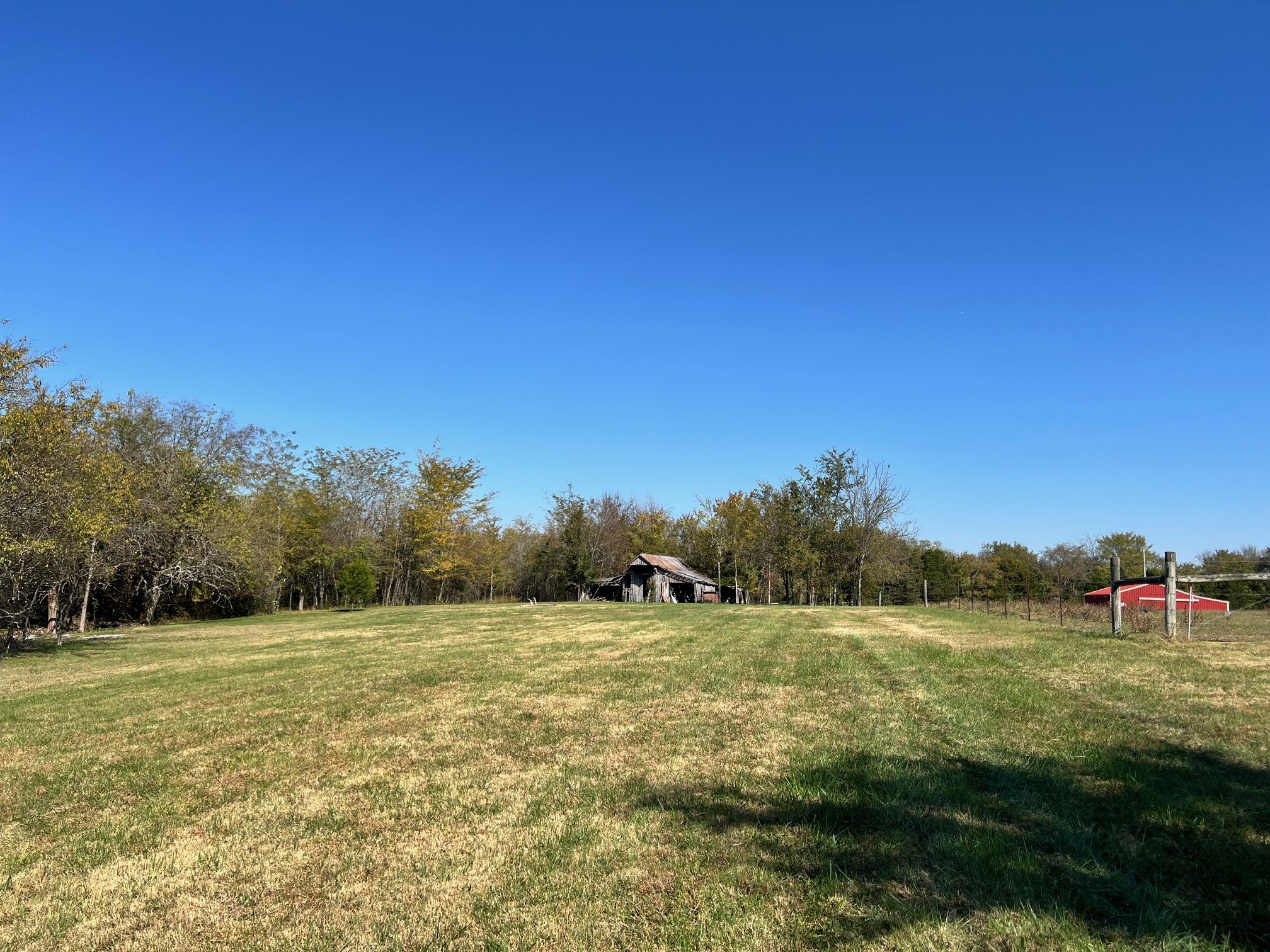 55 Bluebird Rd Extension Lebanon, TN 37087 - Photo 17 of 23 Beautiful cleared pasture on the right side of the property - older wooden barn - with a well (water) in place there by the barn. Beautiful view from here!
