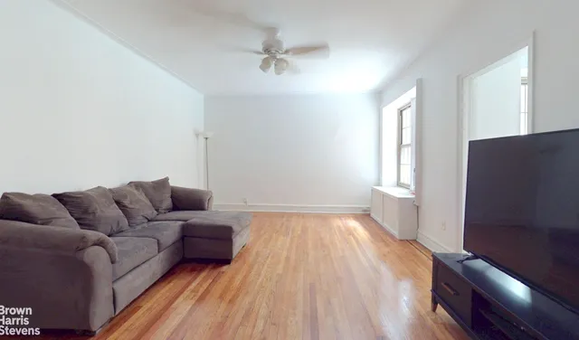 a kitchen with a sink a refrigerator and a stove