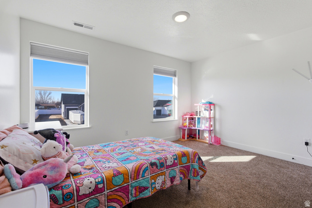 3902 West 825 North West Point, UT 84015 - Photo 8 of 49 Bedroom with carpet flooring and baseboards