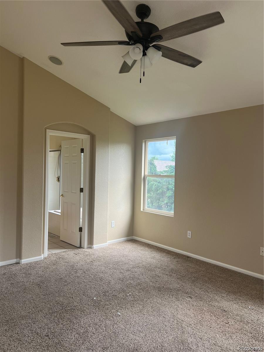 5353 Rhyolite Way Parker, CO 80134 - Photo 18 of 22 a view of an empty room with a window