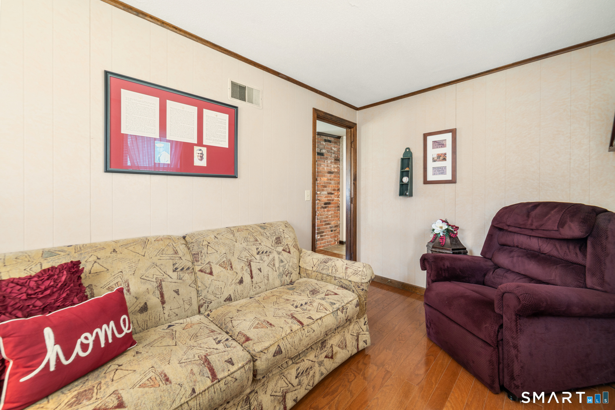 46 Buckboard Lane Bristol, CT 06010 - Photo 19 of 39 a living room with furniture and a couch