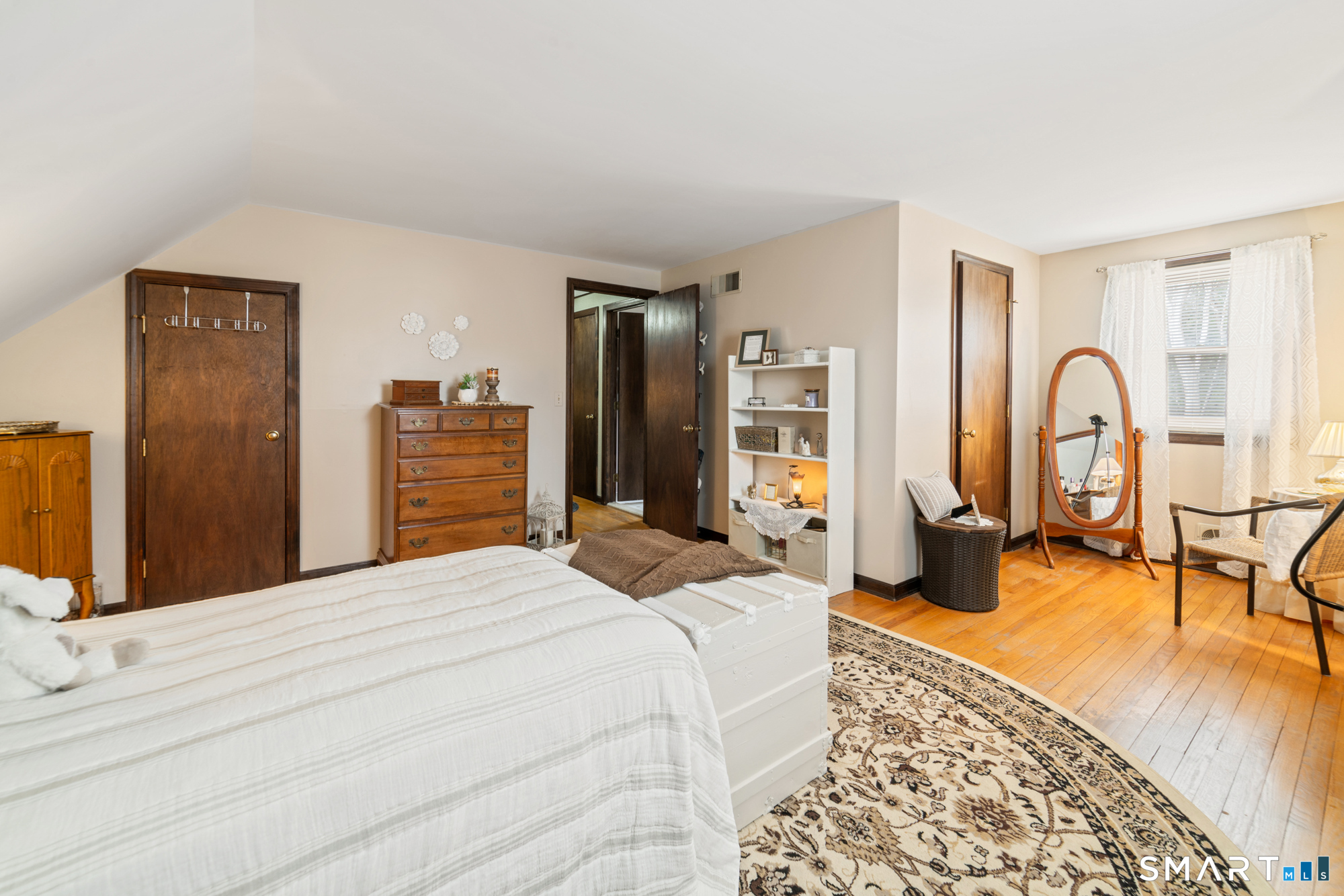 46 Buckboard Lane Bristol, CT 06010 - Photo 25 of 39 a bedroom with a bed a desk and chair
