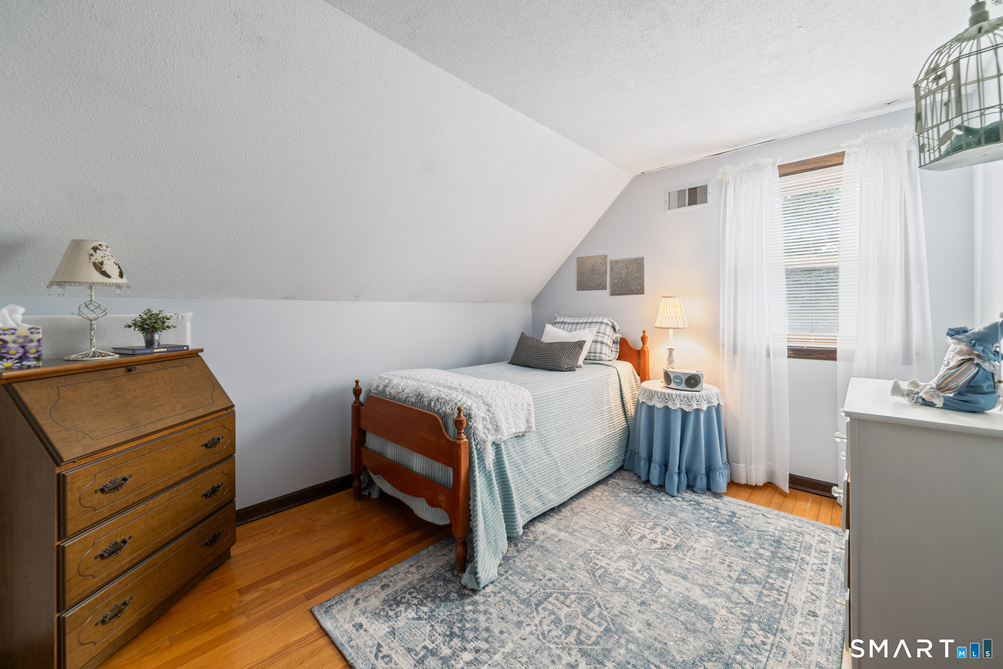 46 Buckboard Lane Bristol, CT 06010 - Photo 26 of 39 a bed room with a bed and a window