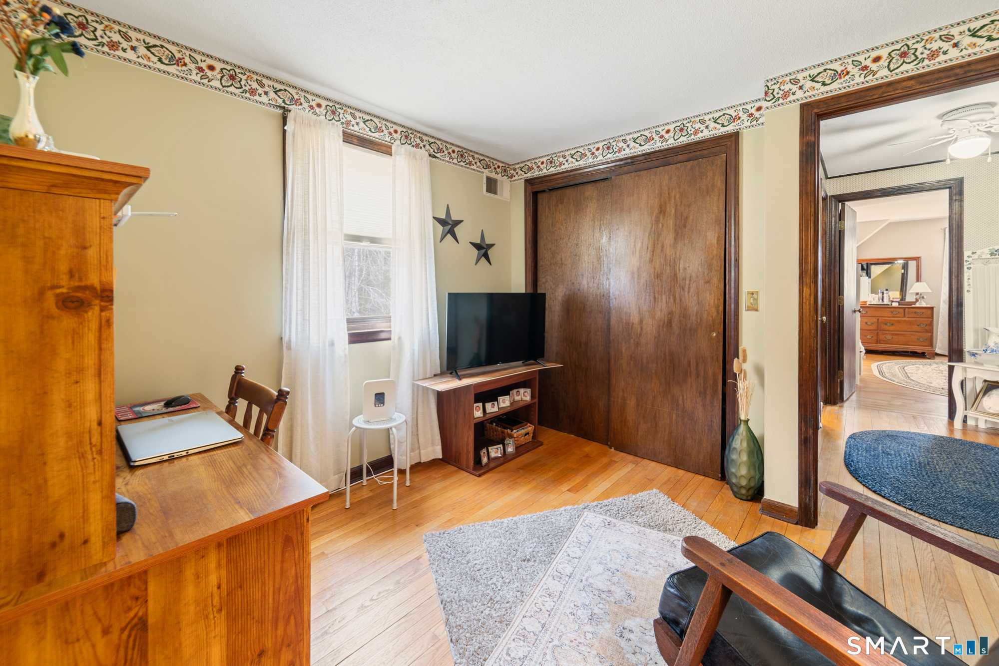 46 Buckboard Lane Bristol, CT 06010 - Photo 30 of 39 a bedroom with a bed and a flat screen tv