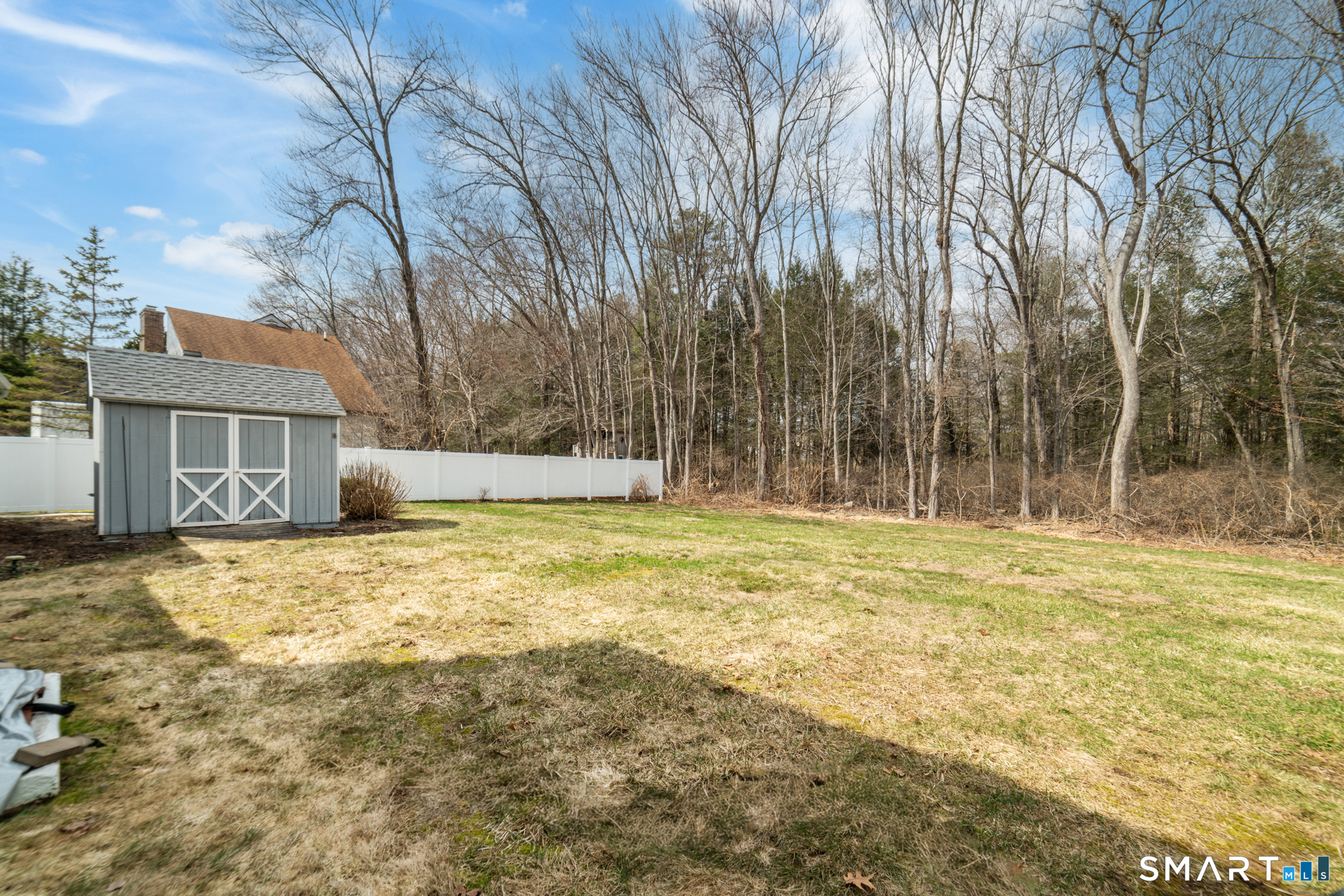 46 Buckboard Lane Bristol, CT 06010 - Photo 38 of 39 a view of a house with a yard